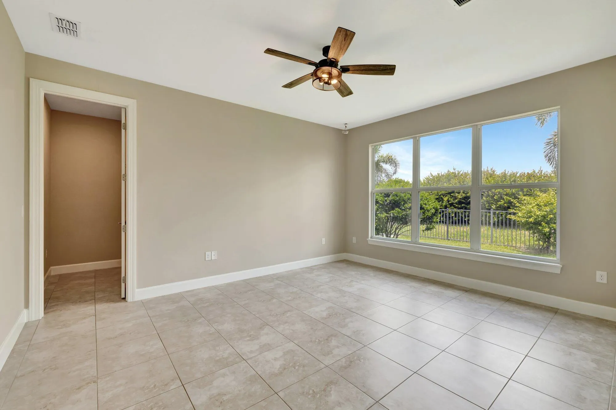 Property Slideshow image 10 of 41 | 9548 sw royal poinciana dr, Port Saint Lucie, FL, 34987