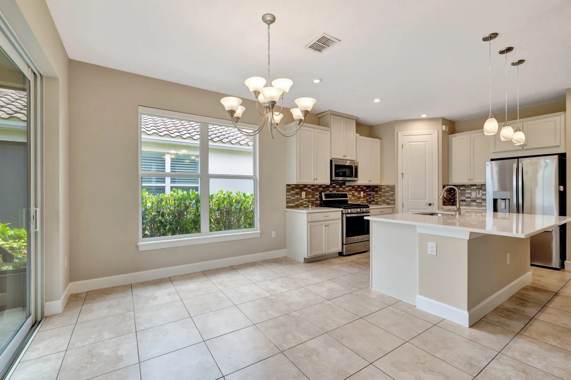 Property Slideshow image 9 of 41 | 9548 sw royal poinciana dr, Port Saint Lucie, FL, 34987