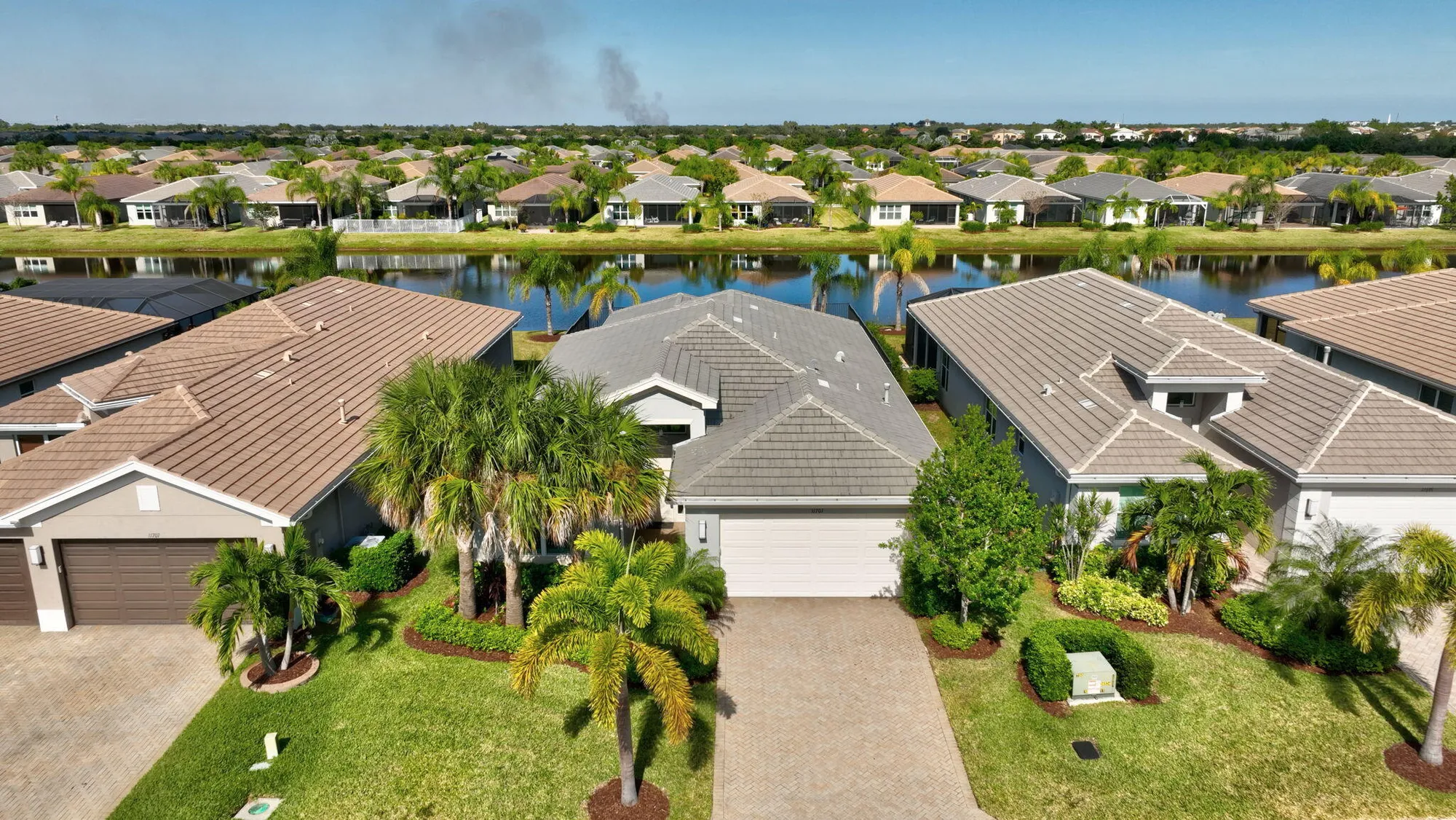 Property Slideshow image 1 of 84 | 11701 sw sailfish isles way, Port Saint Lucie, FL, 34987