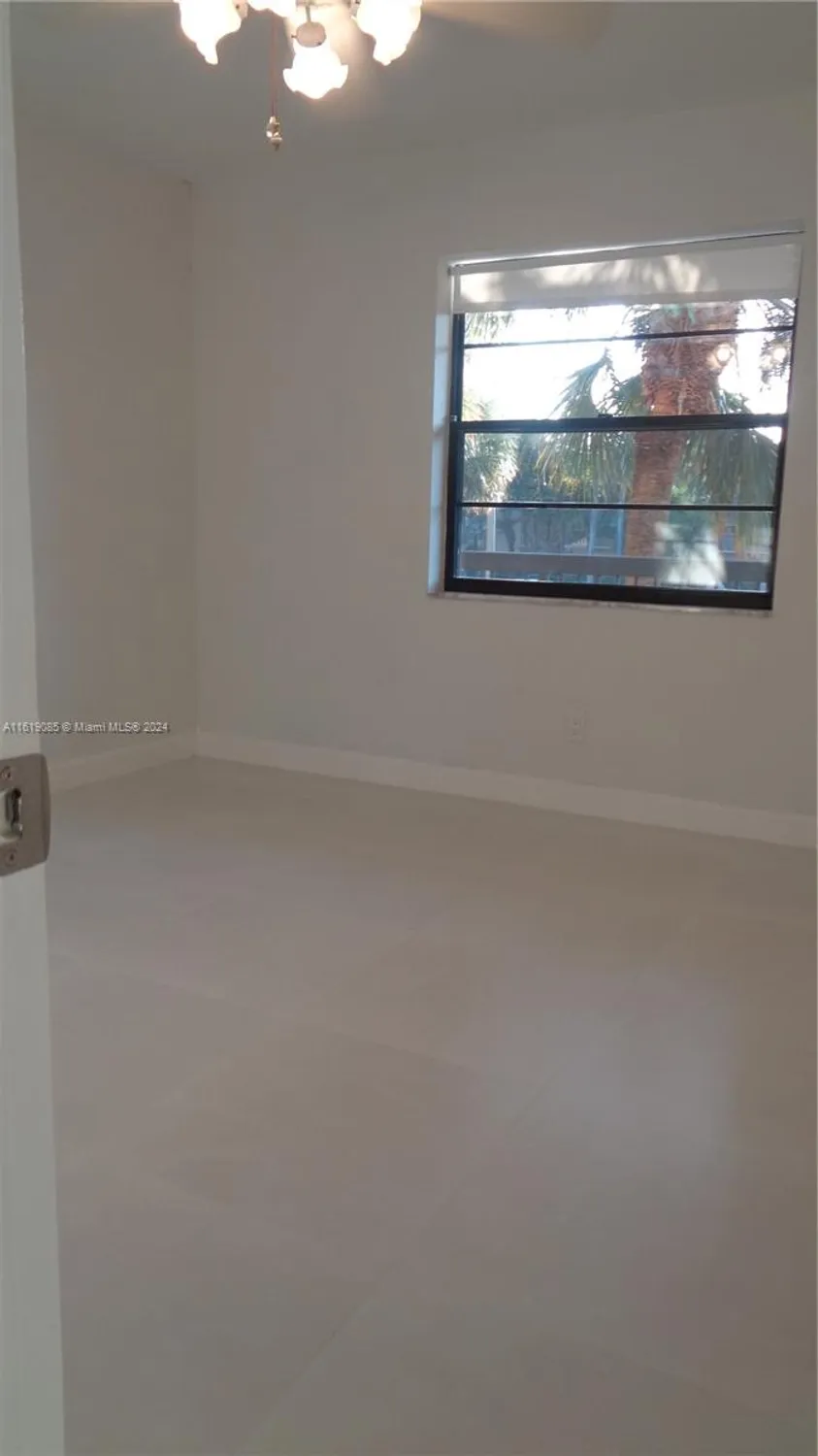 Property Slideshow image 23 of 62 | 6085 n sabal palm blvd apt 204, Tamarac, FL, 33319
