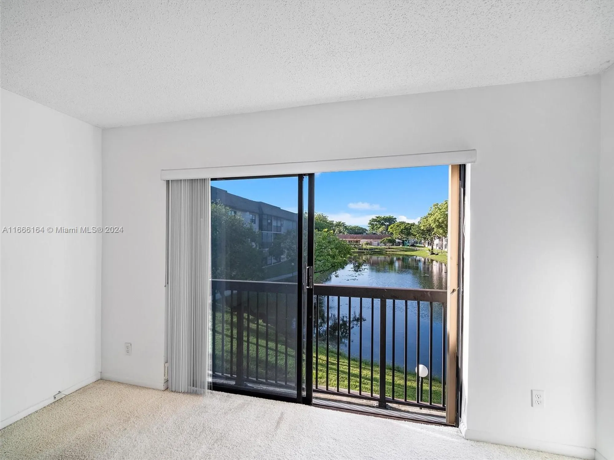 Property Slideshow image 11 of 19 | 6090 n sabal palm blvd 204, Tamarac, FL, 33319