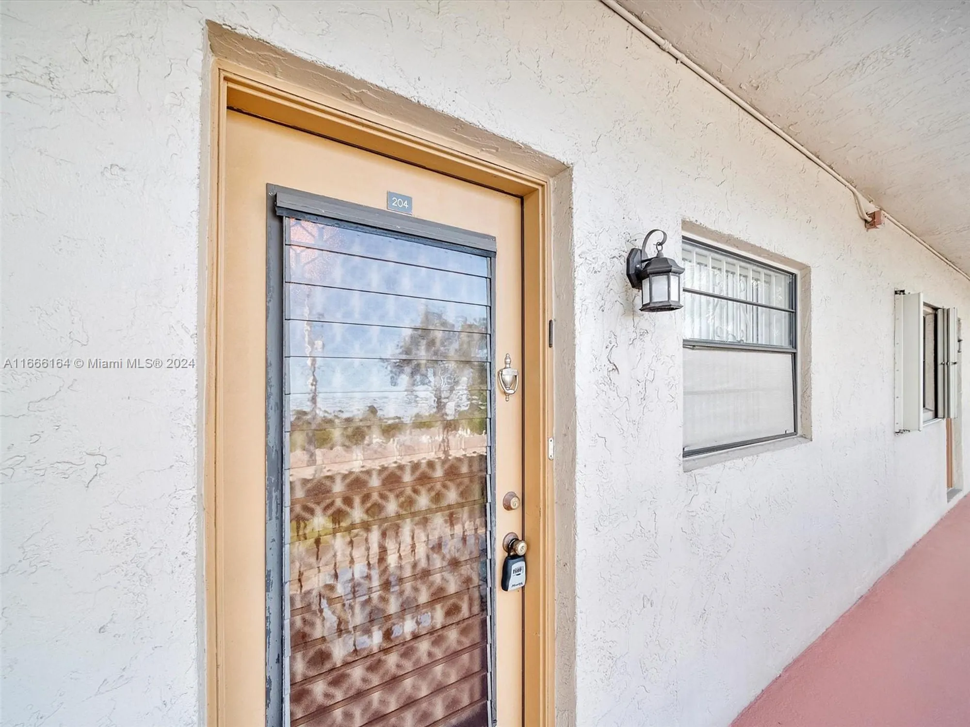 Property Slideshow image 4 of 19 | 6090 n sabal palm blvd 204, Tamarac, FL, 33319