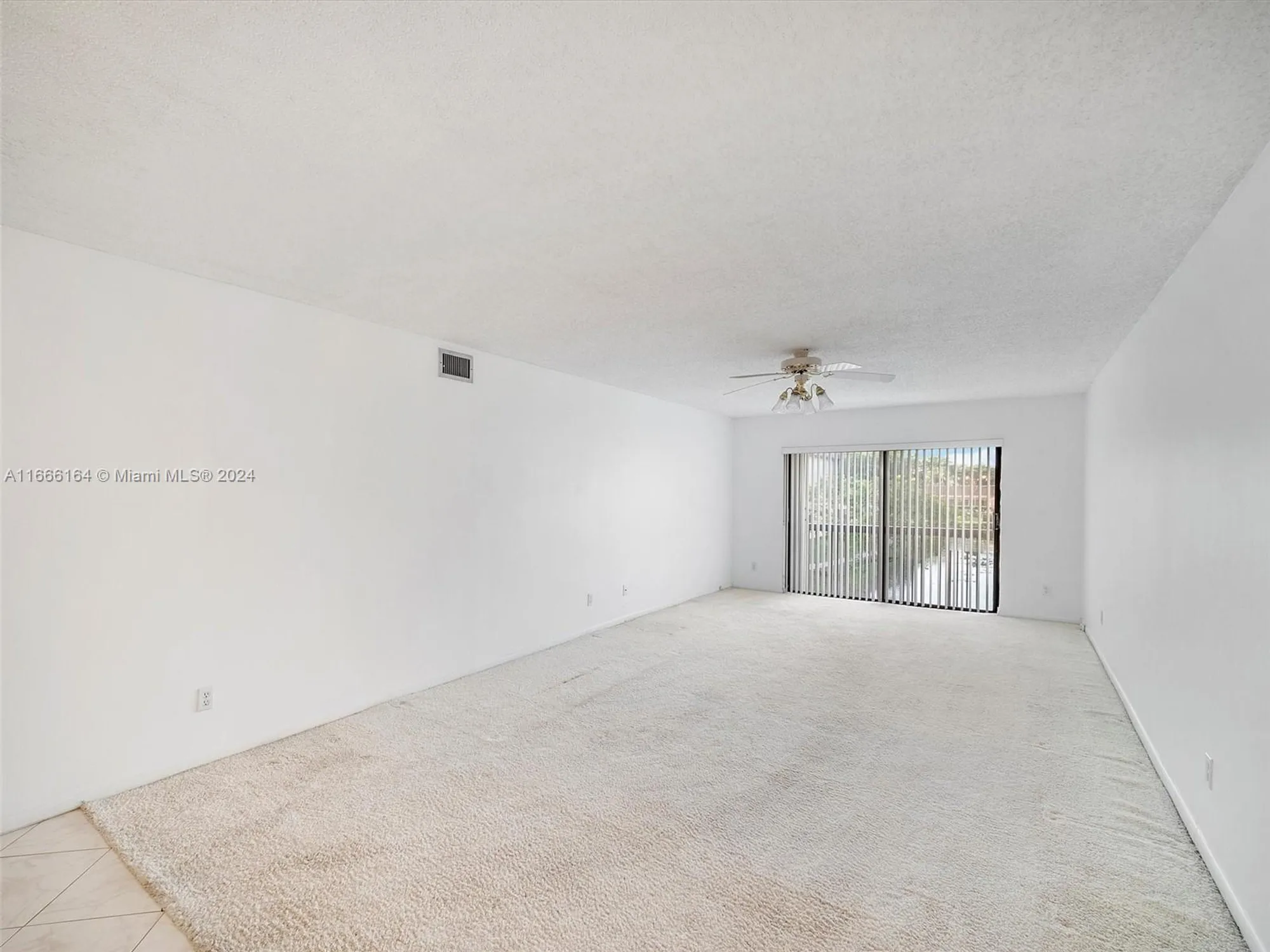 Property Slideshow image 9 of 19 | 6090 n sabal palm blvd 204, Tamarac, FL, 33319