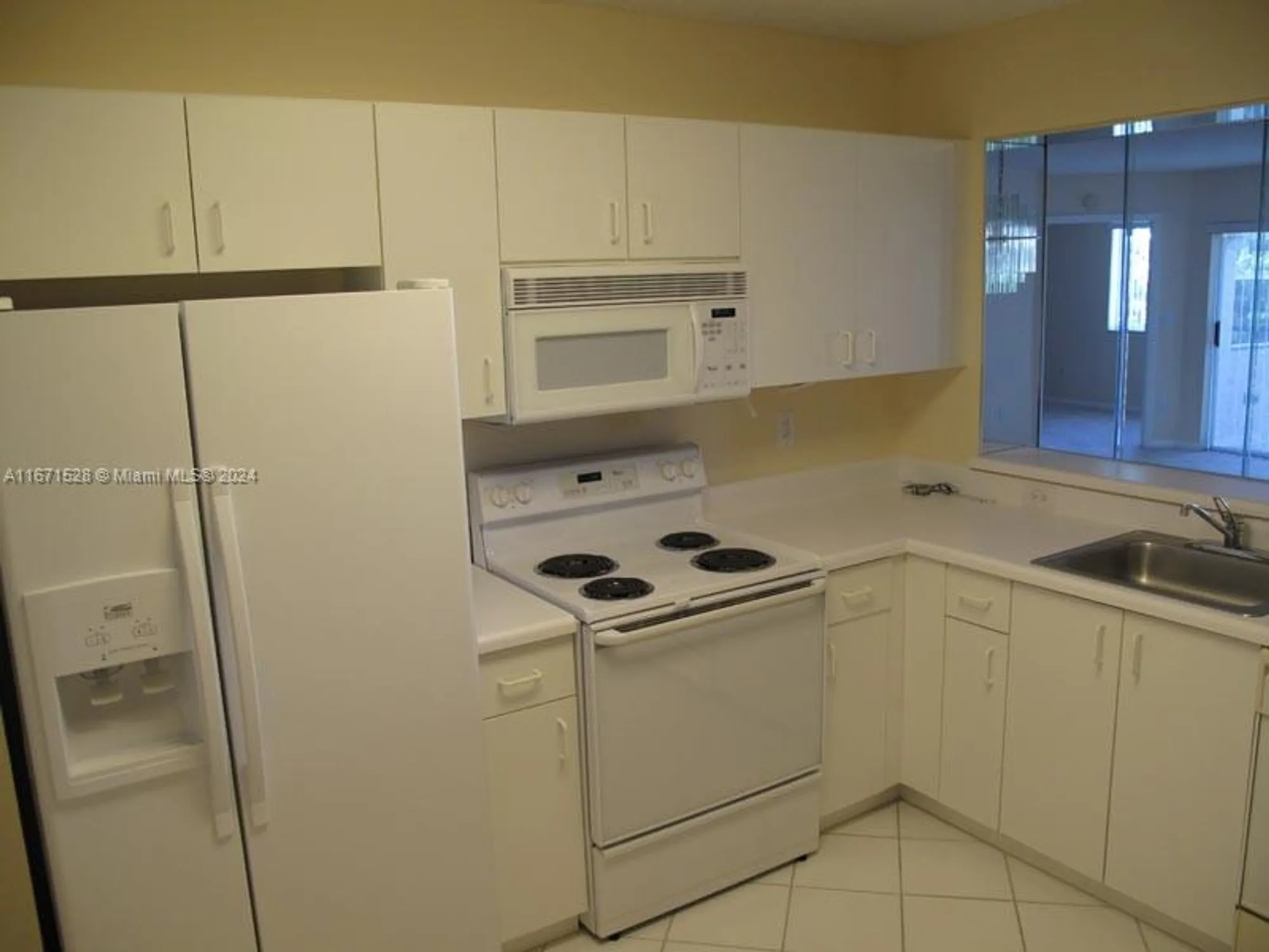 Property Slideshow image 1 of 21 | 9511 weldon cir g402, Tamarac, FL, 33321