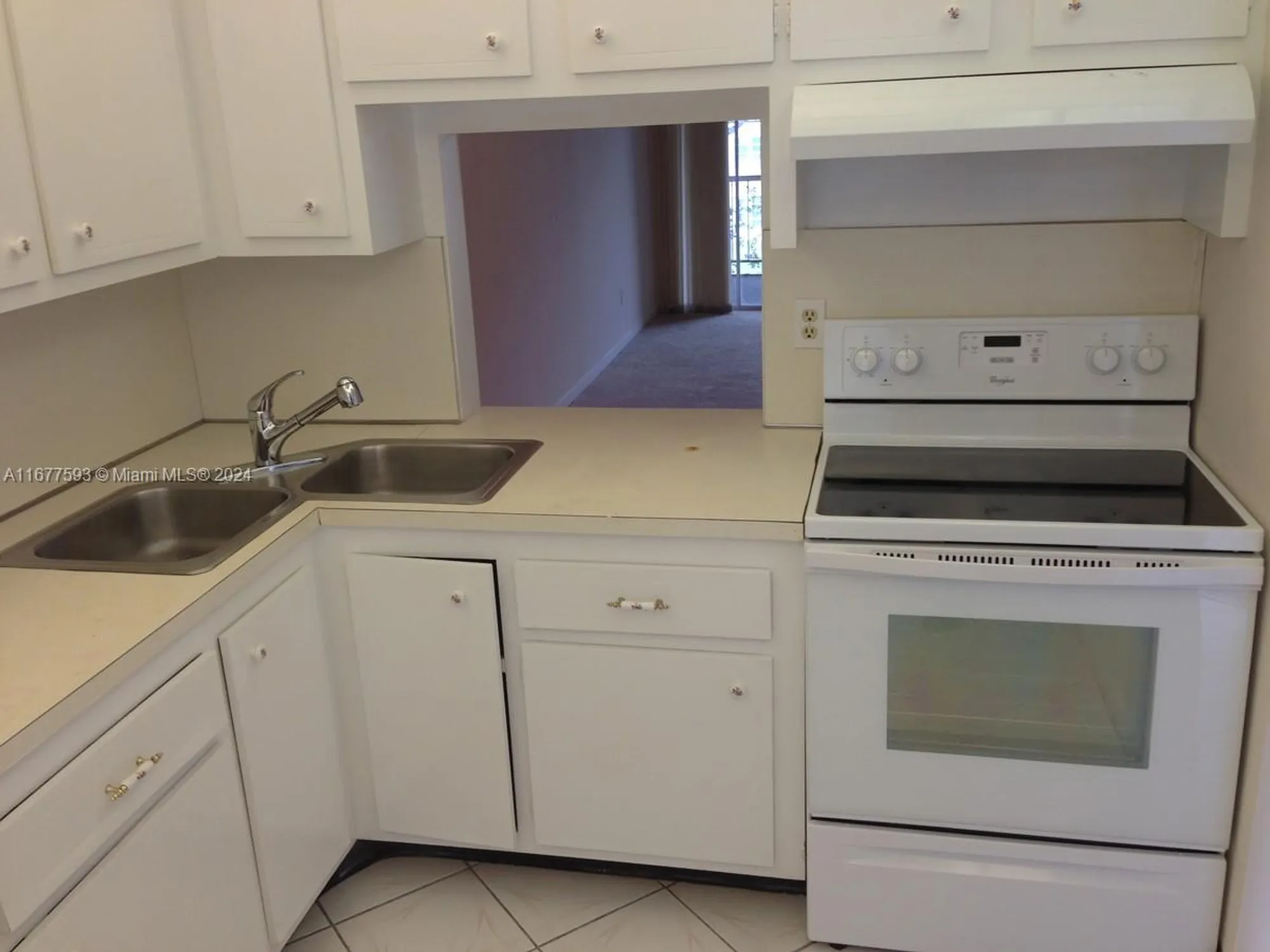 Property Slideshow image 1 of 10 | 5961 nw 61st ave 311, Tamarac, FL, 33319