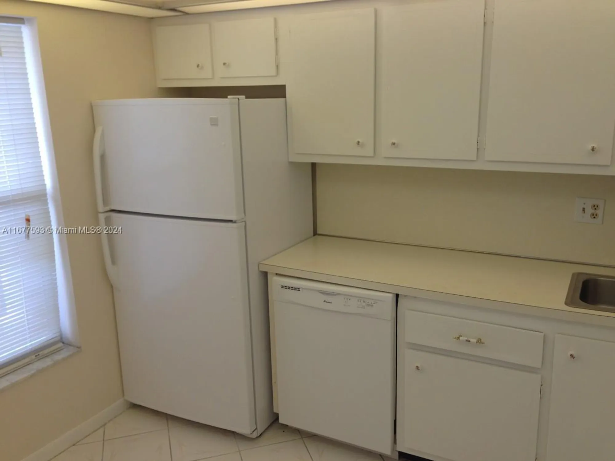 Property Slideshow image 2 of 10 | 5961 nw 61st ave 311, Tamarac, FL, 33319