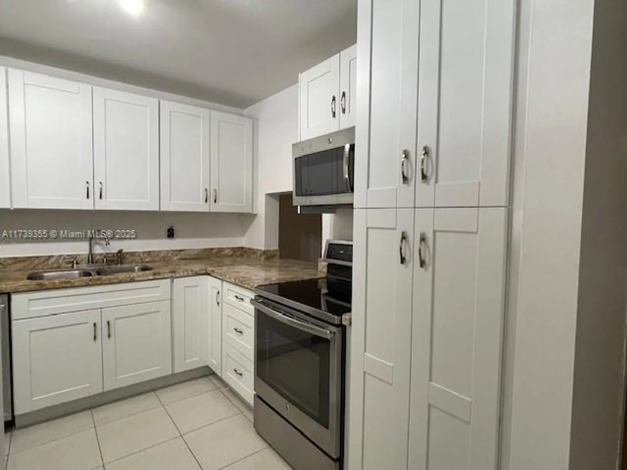 Property Slideshow image 4 of 17 | 6080 n sabal palm blvd 103, Tamarac, FL, 33319