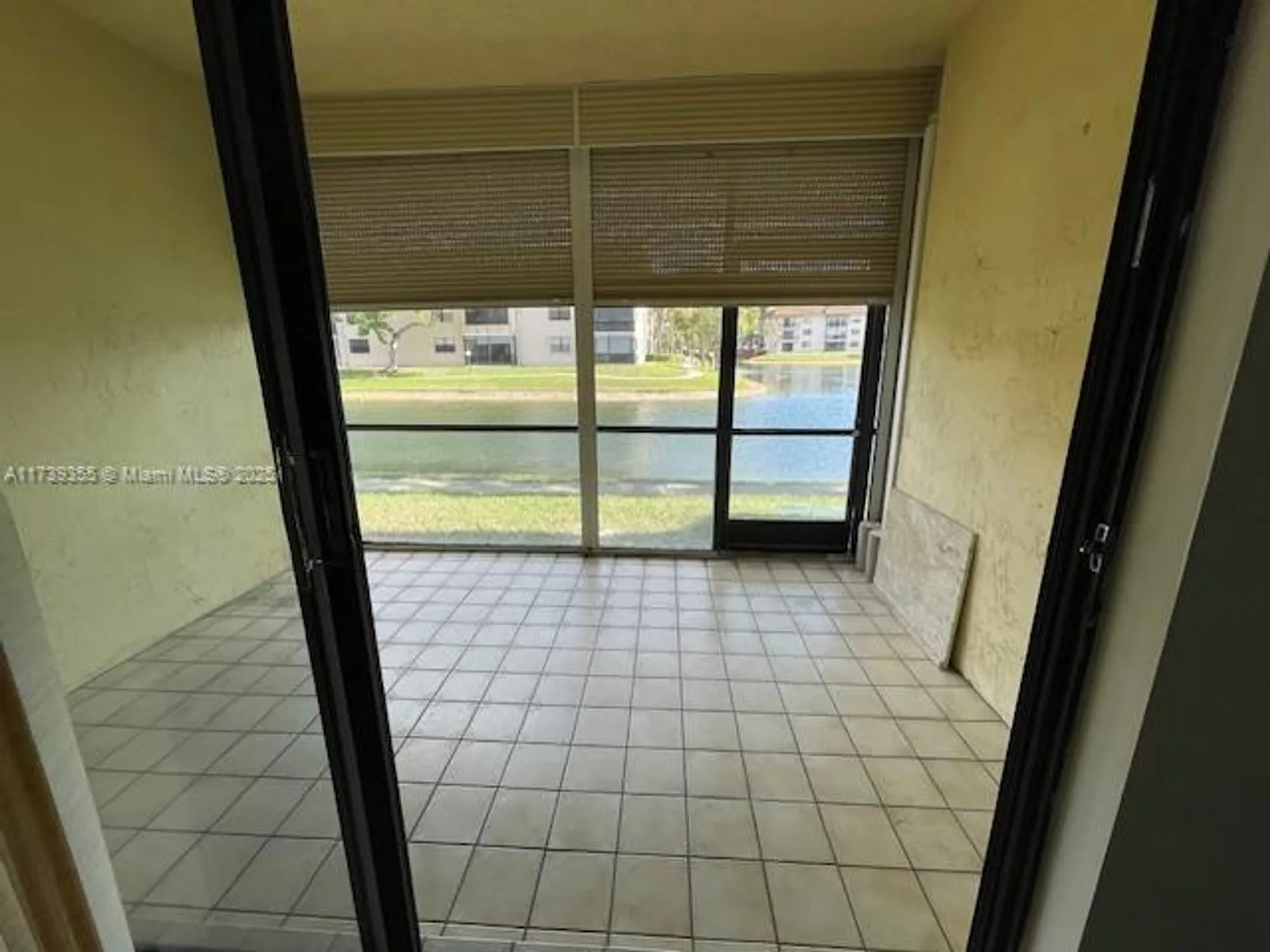 Property Slideshow image 8 of 17 | 6080 n sabal palm blvd 103, Tamarac, FL, 33319