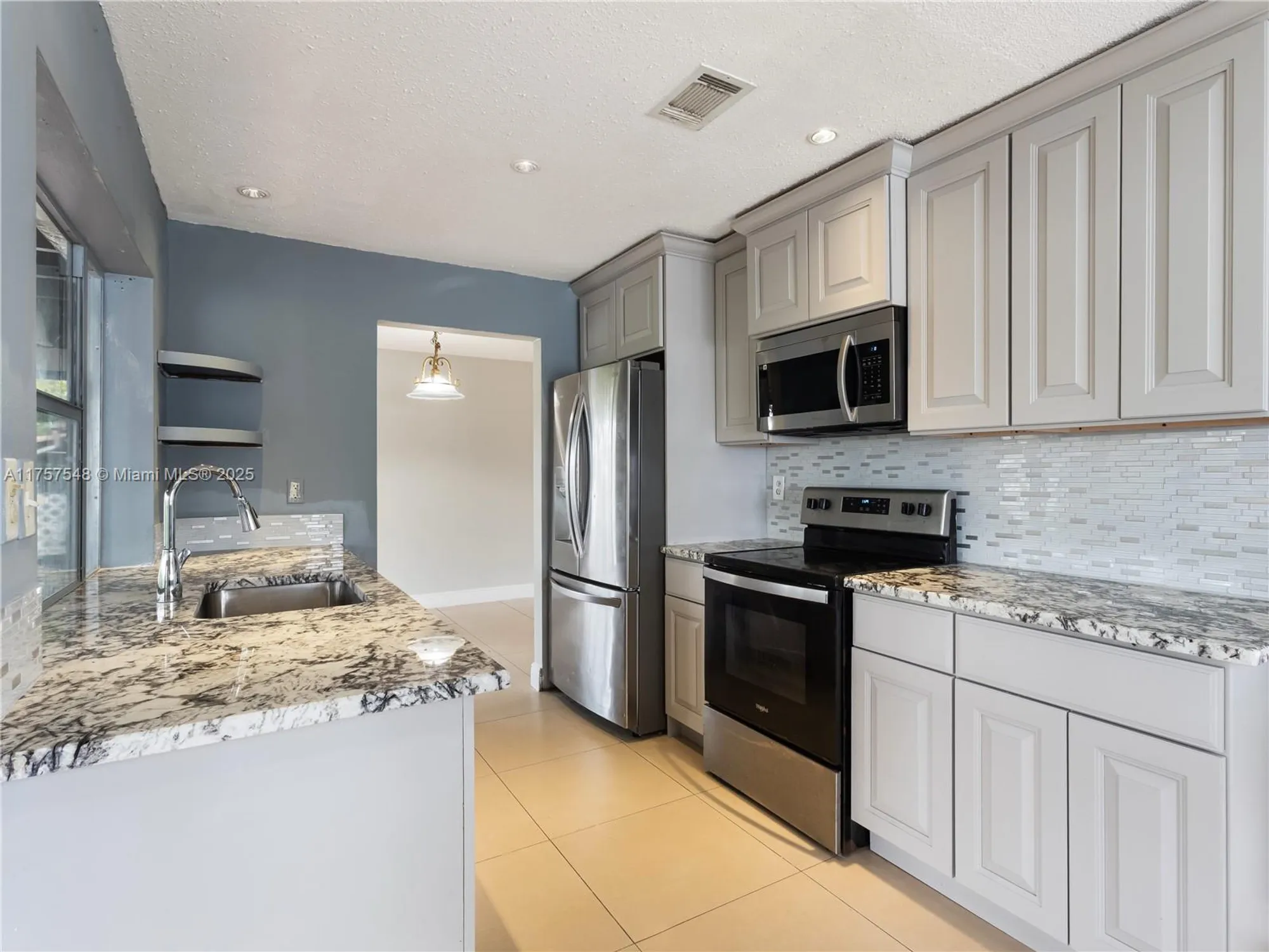 Property Slideshow image 8 of 46 | 4938 nw 48th ave, Tamarac, FL, 33319