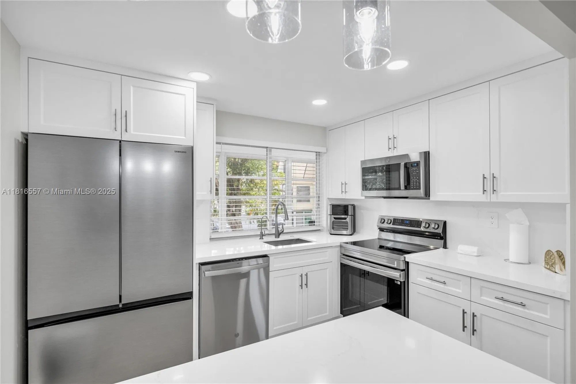 Property Slideshow image 15 of 49 | 9091 lime bay blvd 211, Tamarac, FL, 33321