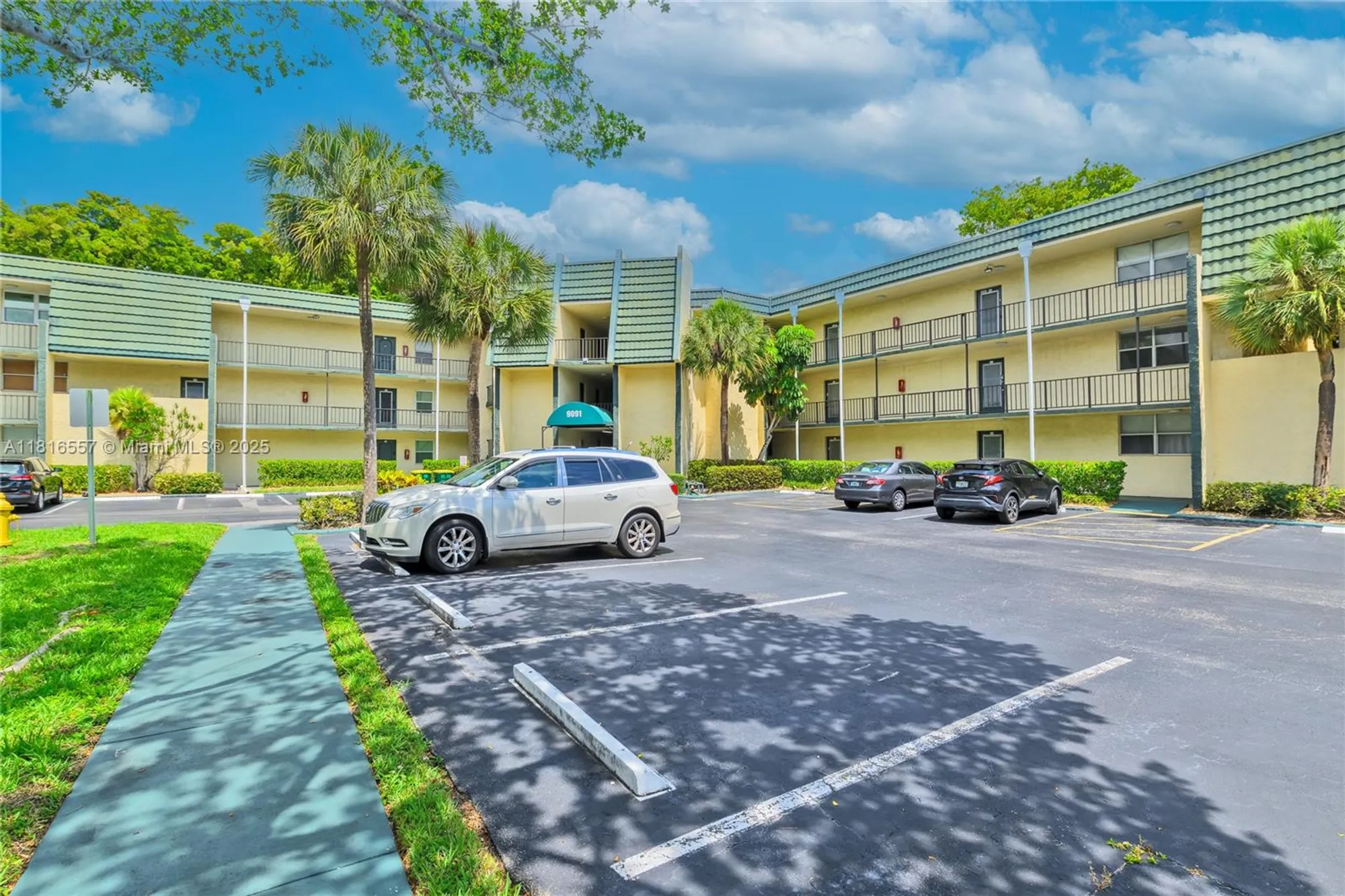 Property Slideshow image 3 of 49 | 9091 lime bay blvd 211, Tamarac, FL, 33321