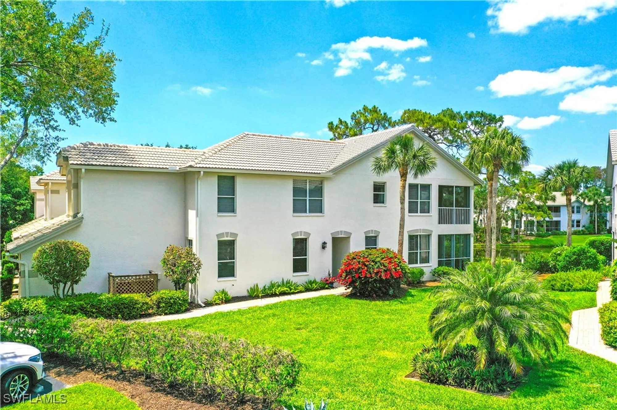 Property Slideshow image 4 of 39 | 27071 lake harbor ct 103, Bonita Springs, FL, 34134
