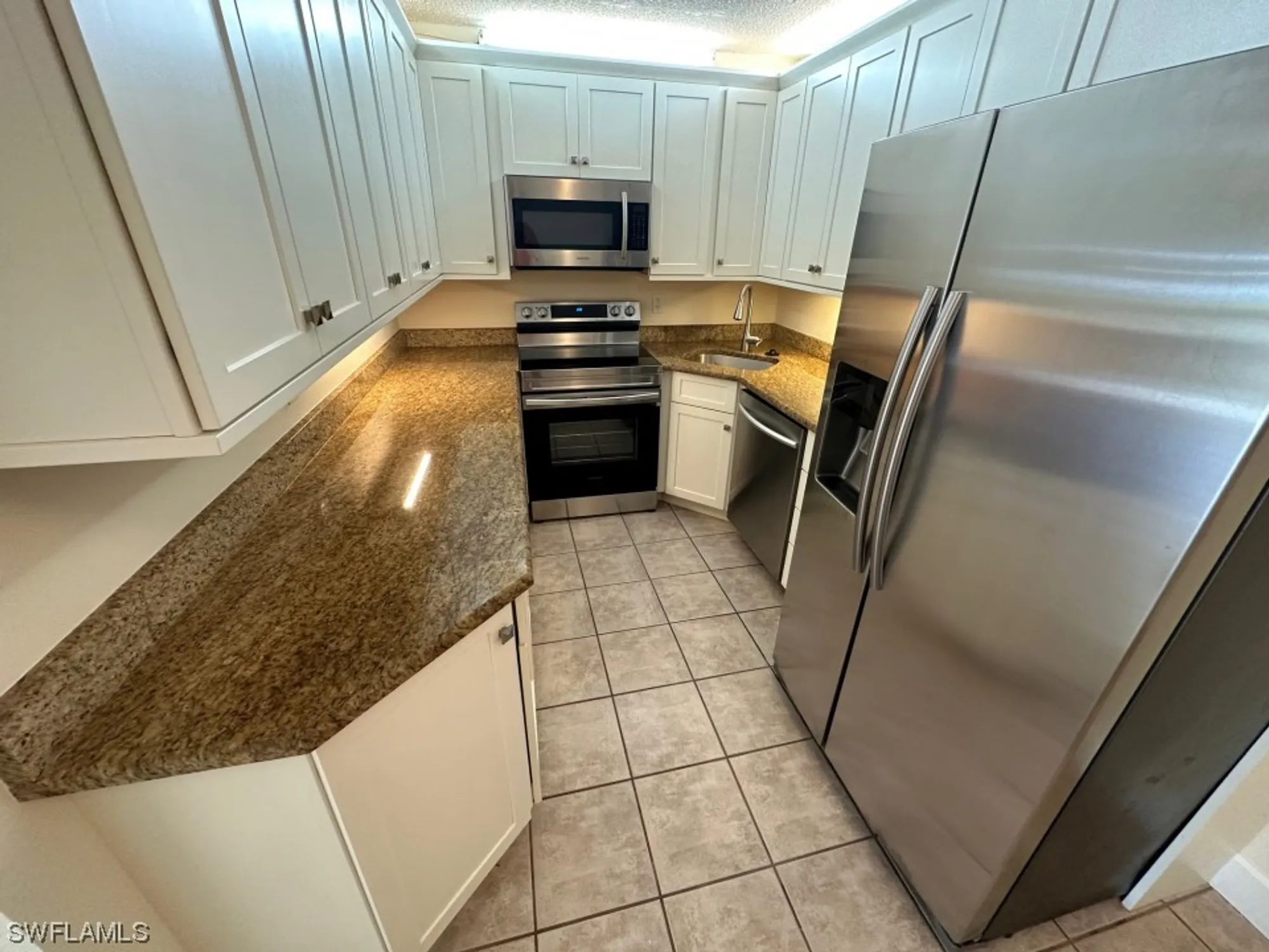 Property Slideshow image 5 of 15 | 4681 lakeside club blvd apt 1, Fort Myers, FL, 33905