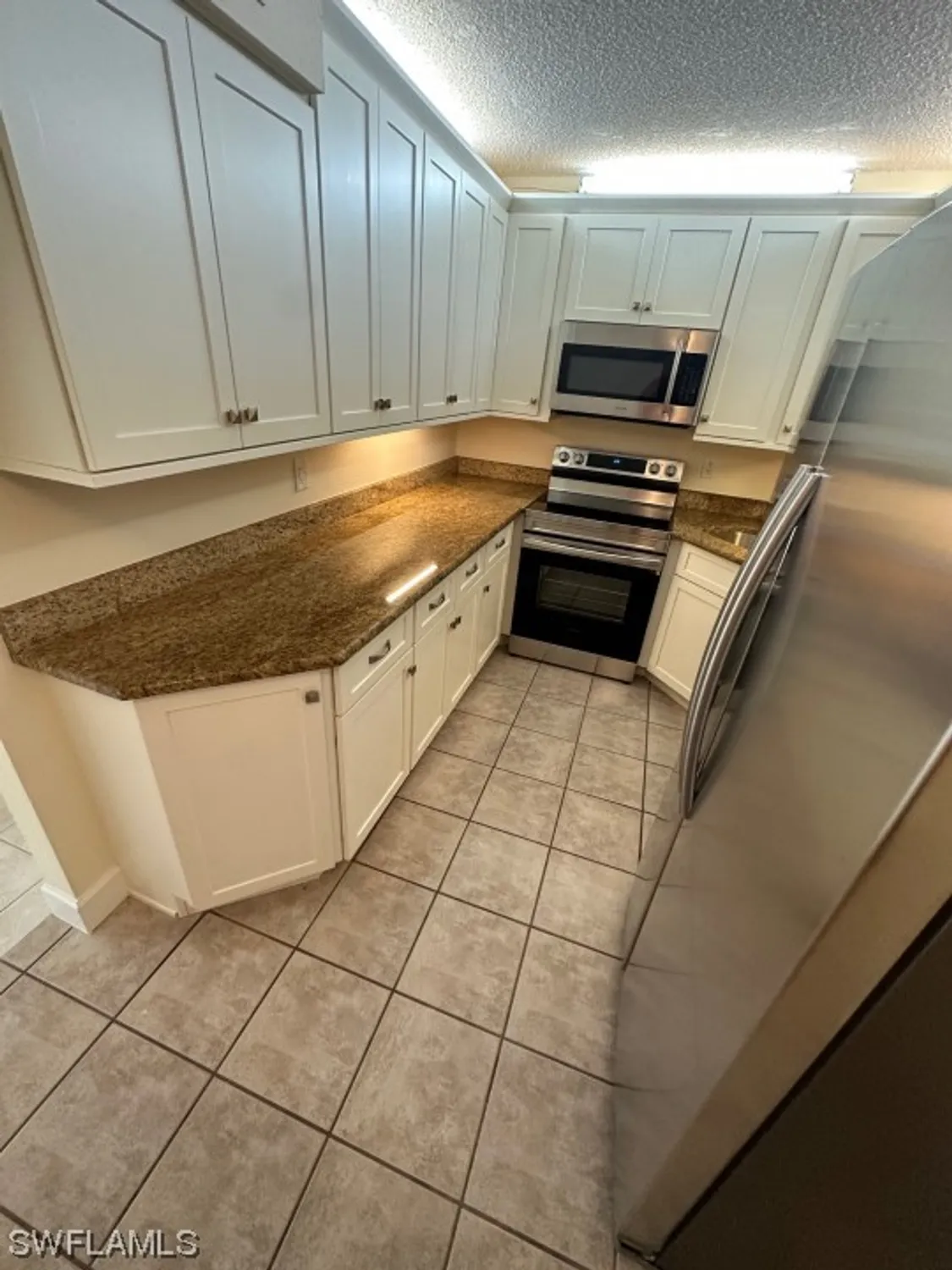 Property Slideshow image 7 of 15 | 4681 lakeside club blvd apt 1, Fort Myers, FL, 33905