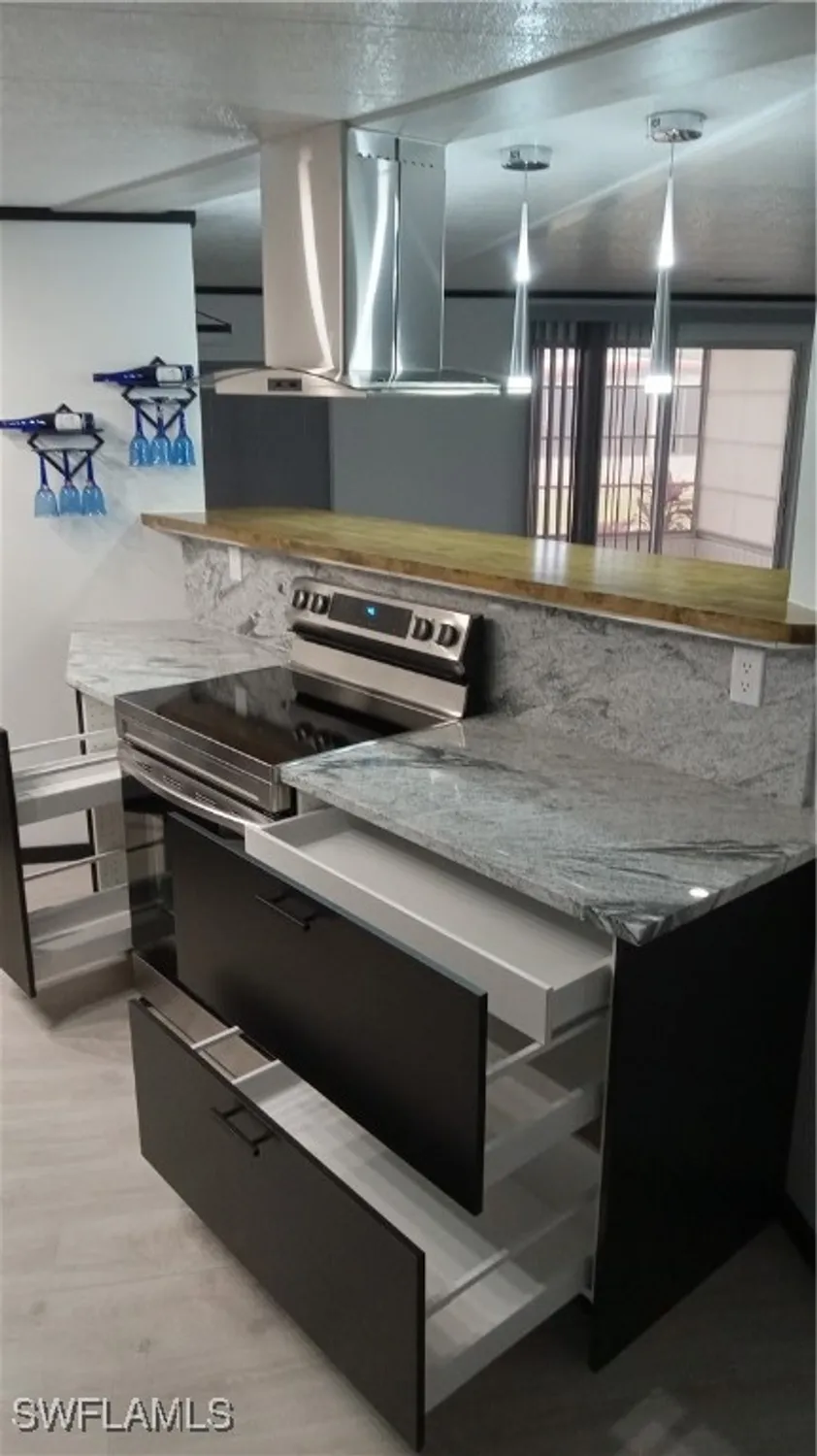 Property Slideshow image 7 of 38 | 5502 ben franklin ln, North Fort Myers, FL, 33917