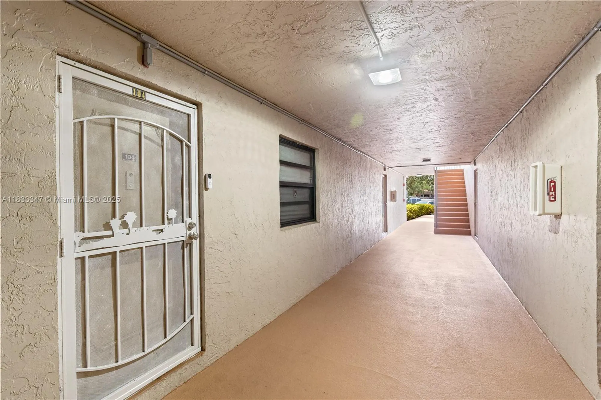 Property Slideshow image 2 of 28 | 8150 w mcnab rd apt 104, Tamarac, FL, 33321