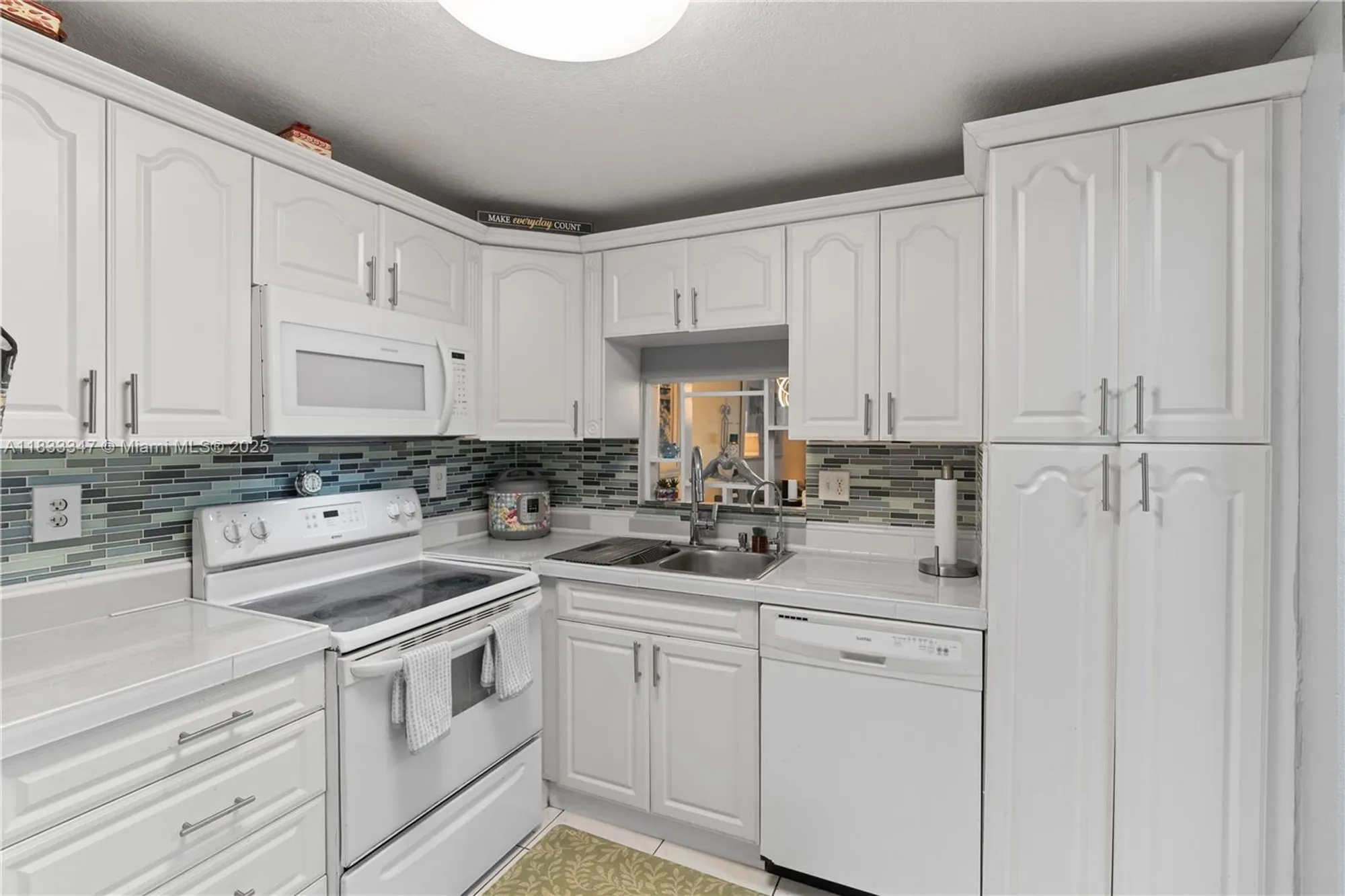 Property Slideshow image 8 of 28 | 8150 w mcnab rd apt 104, Tamarac, FL, 33321