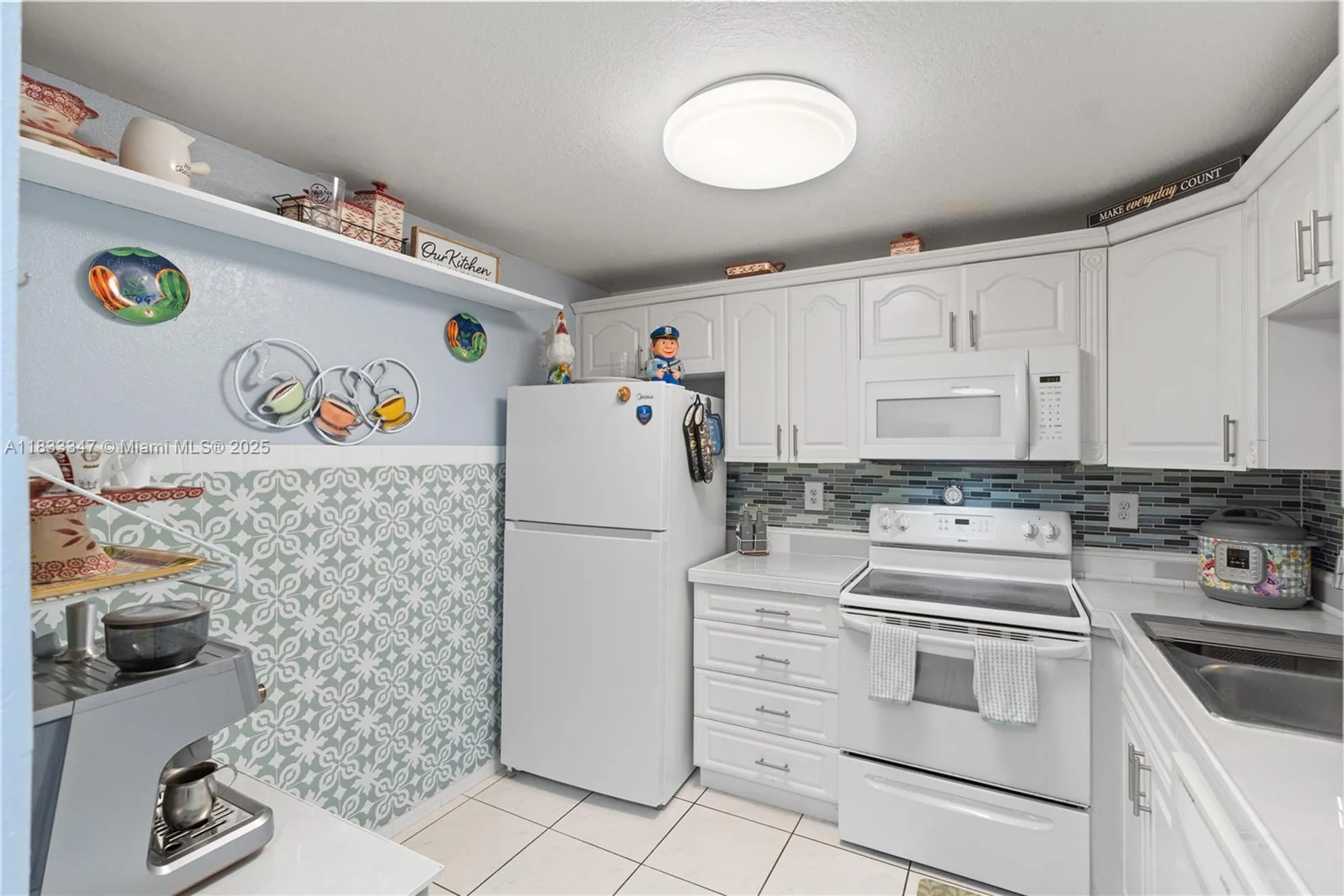 Property Slideshow image 9 of 28 | 8150 w mcnab rd apt 104, Tamarac, FL, 33321