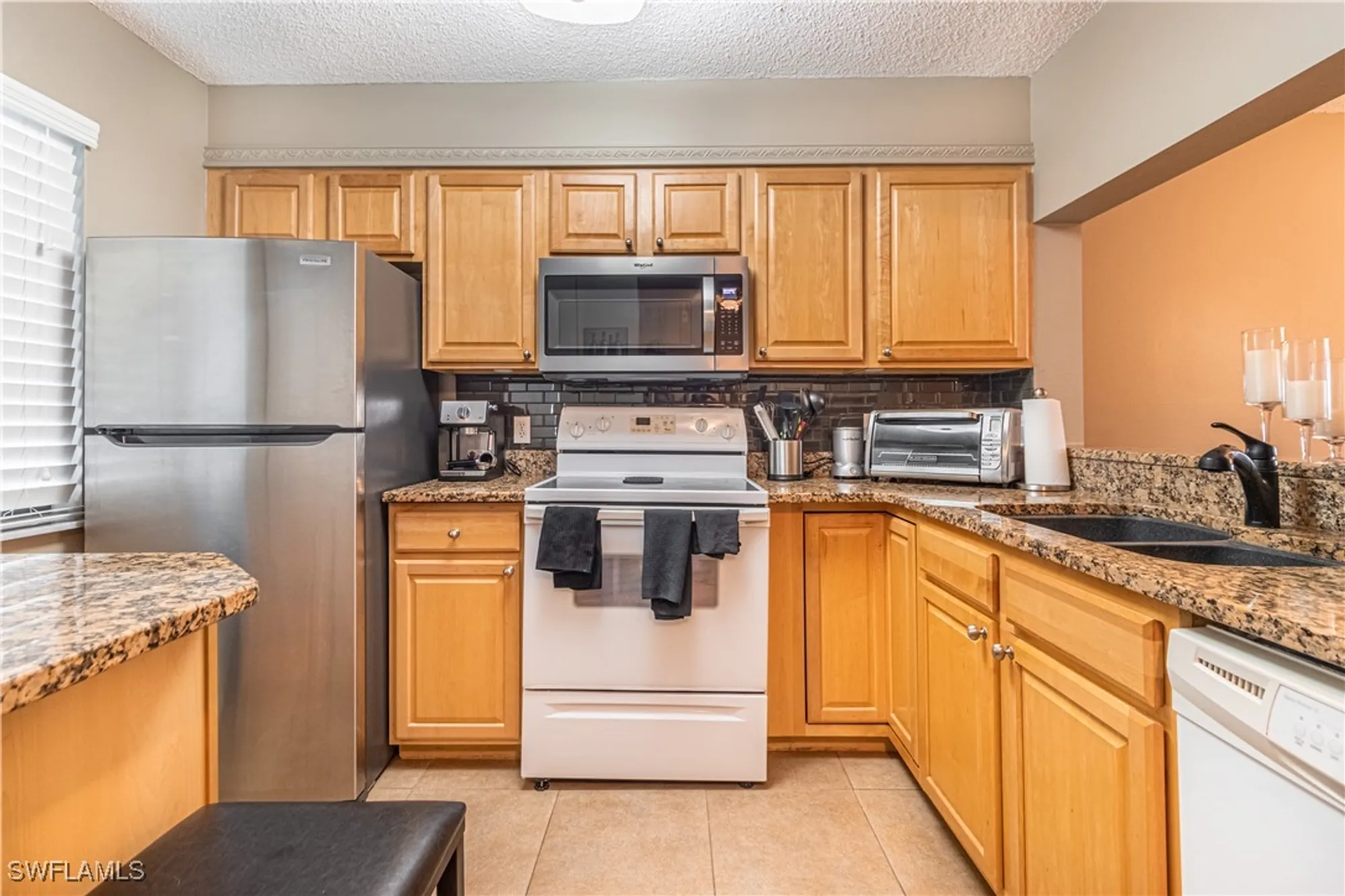 Property Slideshow image 1 of 34 | 7406 lake breeze dr 312, Fort Myers, FL, 33907