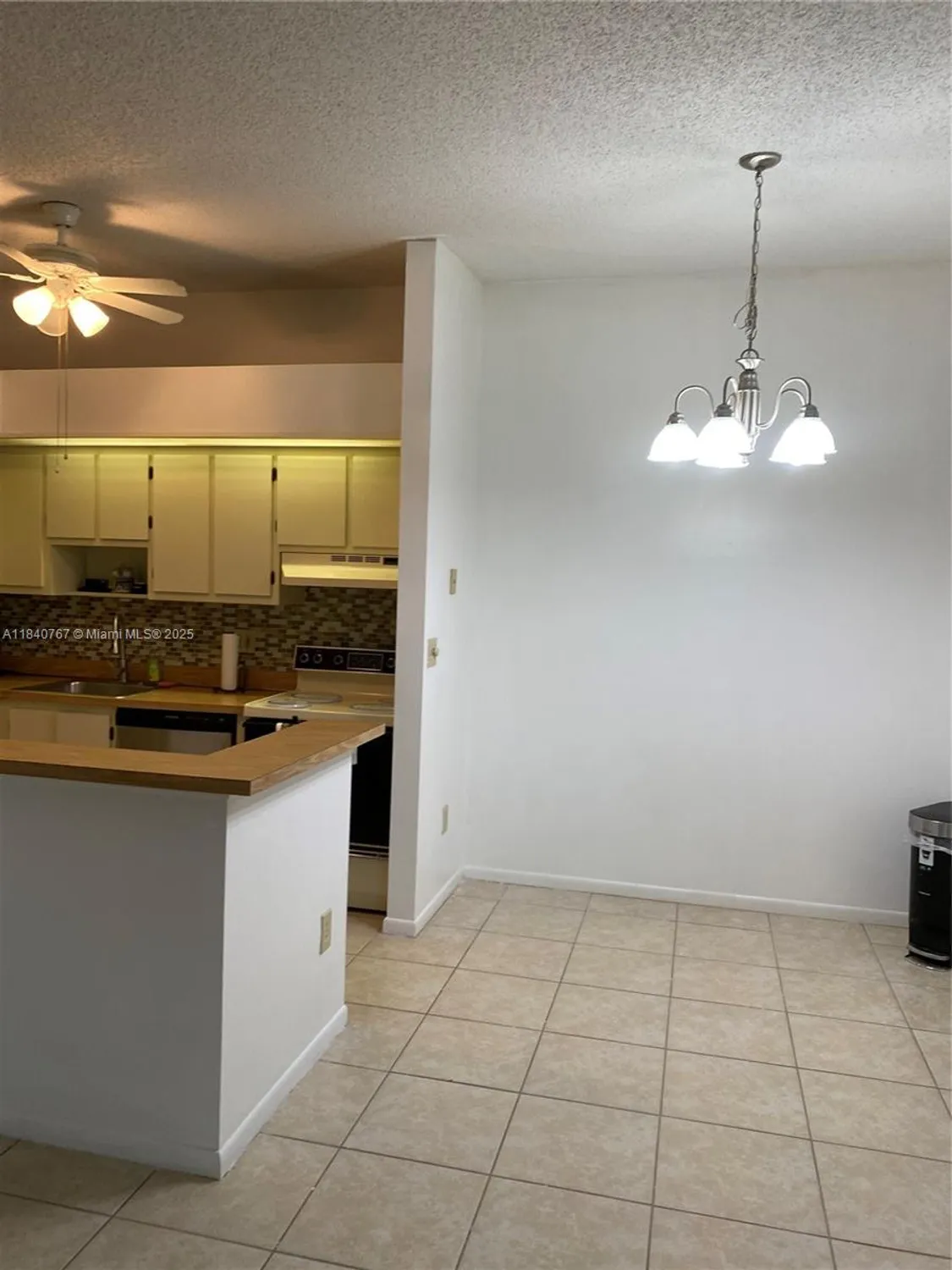 Property Slideshow image 6 of 15 | 10407 e clairmont cir 210, Tamarac, FL, 33321