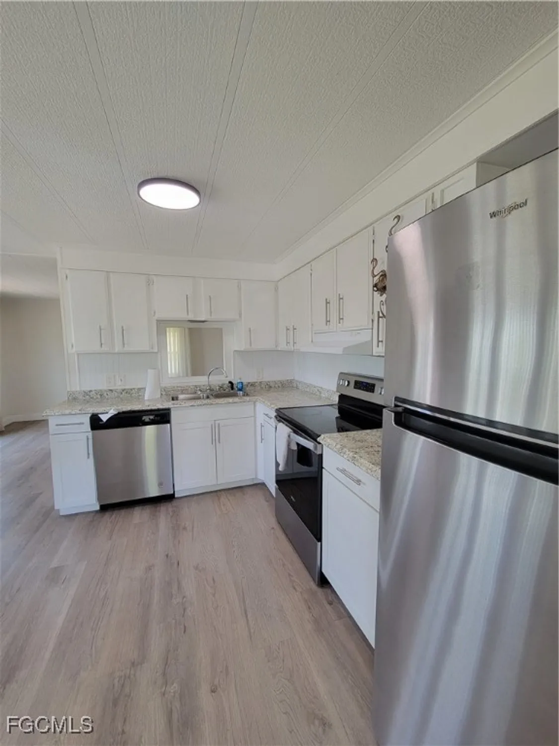 Property Slideshow image 4 of 24 | 5502 sir walter way, North Fort Myers, FL, 33917