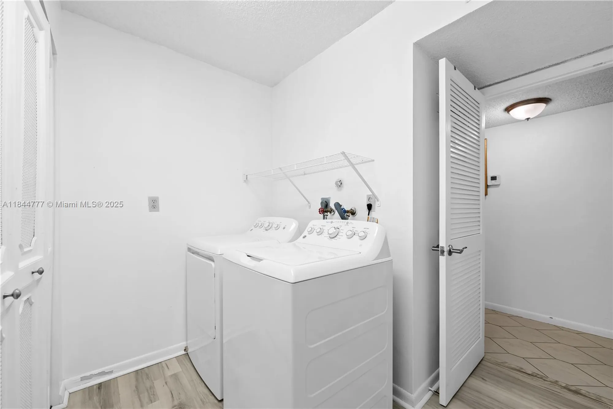 Property Slideshow image 12 of 18 | 4970 e sabal palm blvd apt 309, Tamarac, FL, 33319