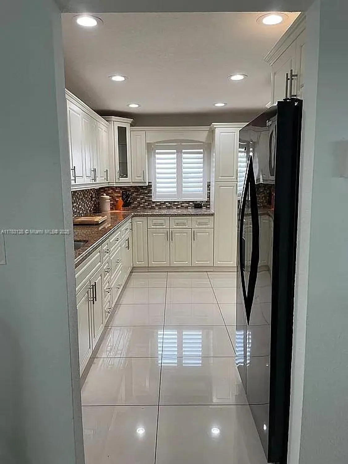 Property Slideshow image 17 of 75 | 1411 nw 90th dr, Plantation, FL, 33322