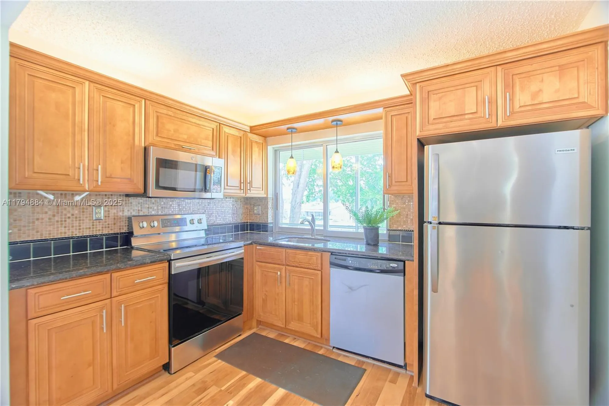 Property Slideshow image 9 of 39 | 9150 lime bay blvd apt 201, Tamarac, FL, 33321