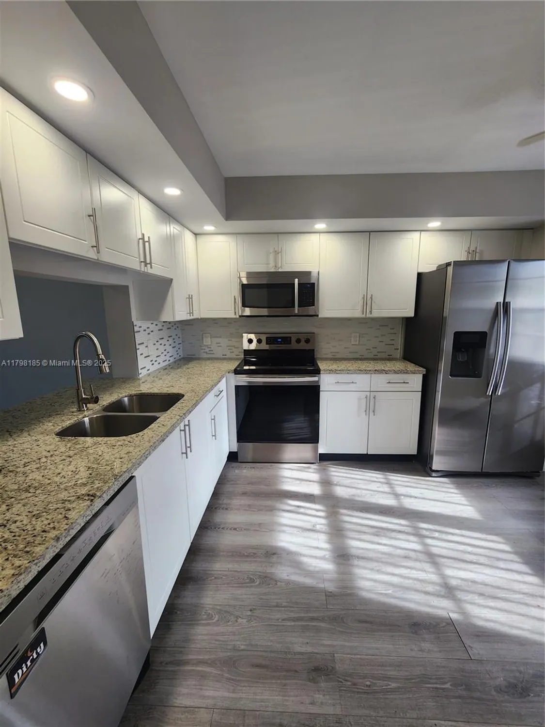 Property Slideshow image 3 of 24 | 1401 sw 128th ter apt 305h, Pembroke Pines, FL, 33027