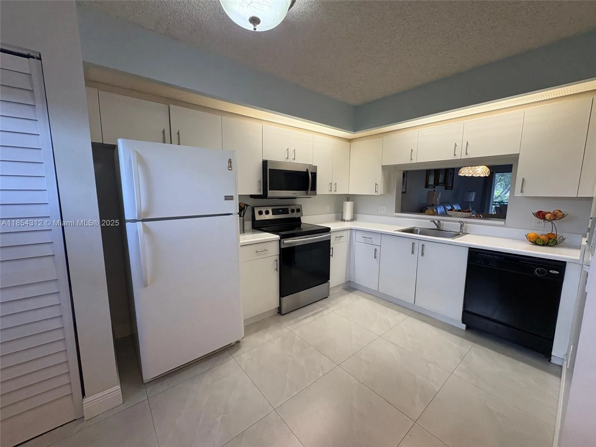 Property Slideshow image 14 of 25 | 12955 sw 16th ct 205m, Pembroke Pines, FL, 33027