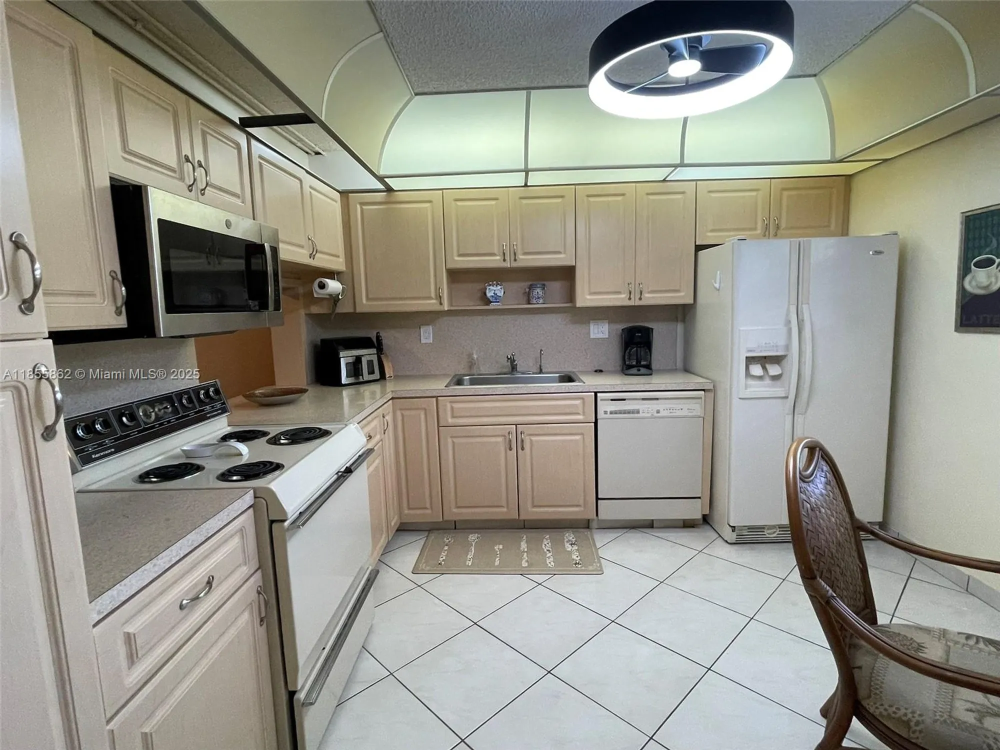Property Slideshow image 1 of 33 | 4975 e sabal palm blvd 208, Tamarac, FL, 33319