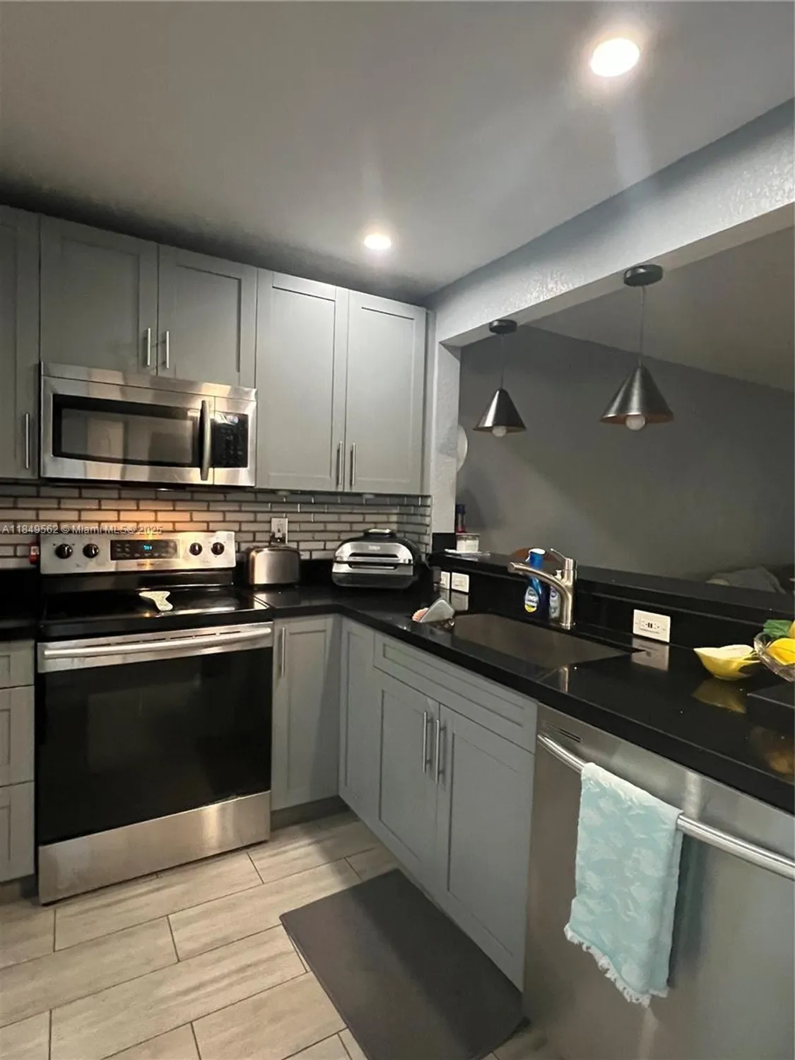 Property Slideshow image 2 of 19 | 5830 nw 64th ave apt 103, Tamarac, FL, 33319