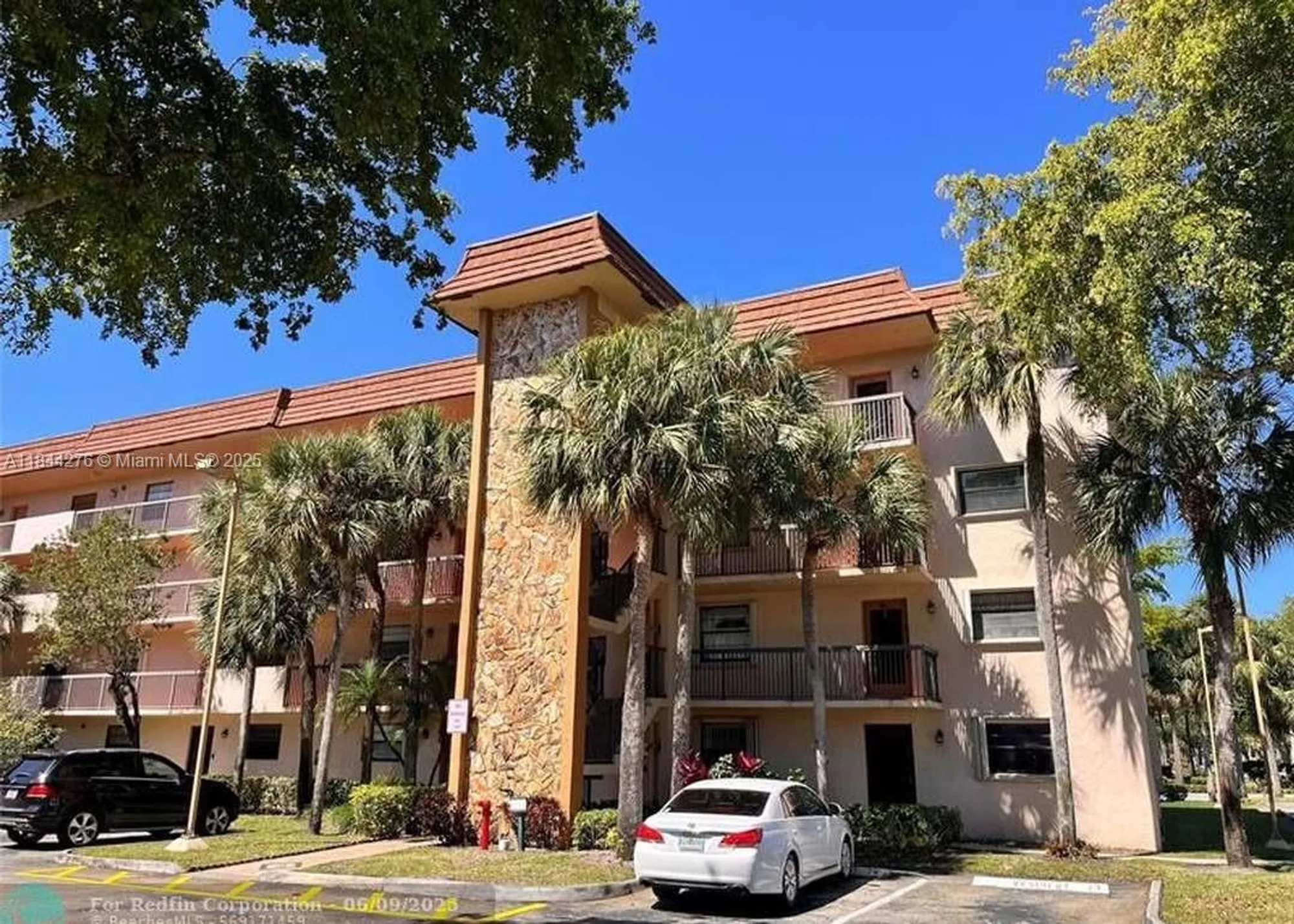 Property Slideshow image 1 of 31 | 4940 e sabal palm blvd 205, Tamarac, FL, 33319