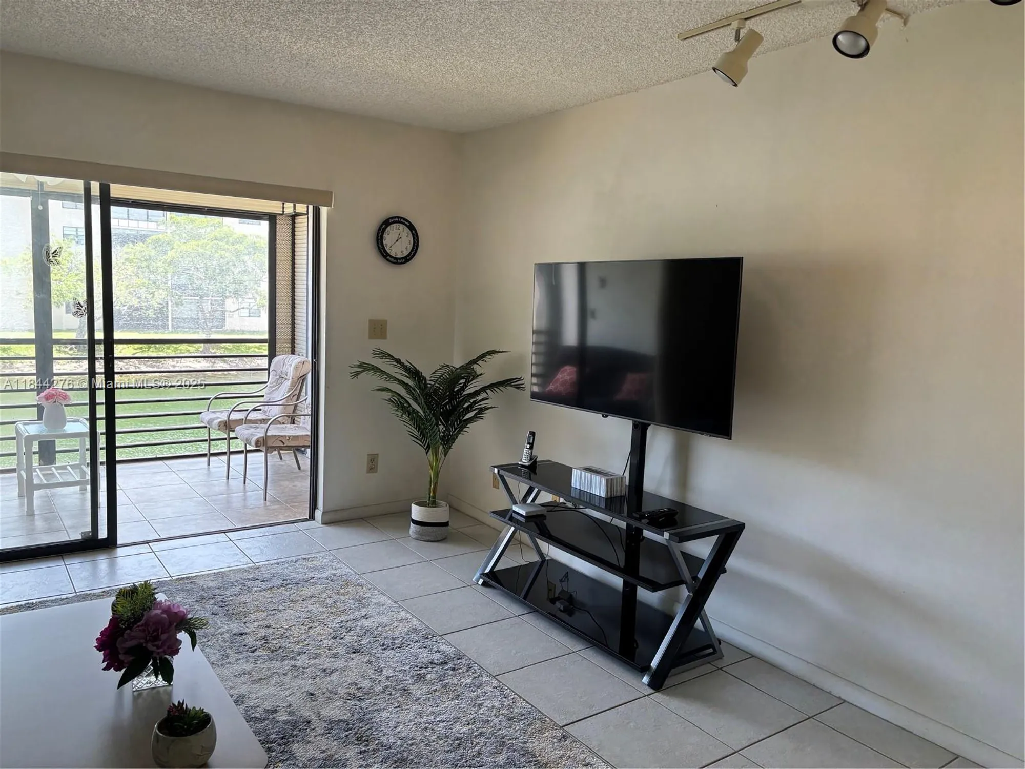 Property Slideshow image 10 of 31 | 4940 e sabal palm blvd 205, Tamarac, FL, 33319