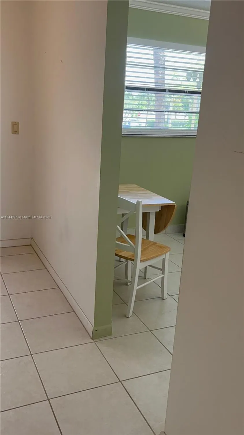 Property Slideshow image 24 of 31 | 4940 e sabal palm blvd 205, Tamarac, FL, 33319