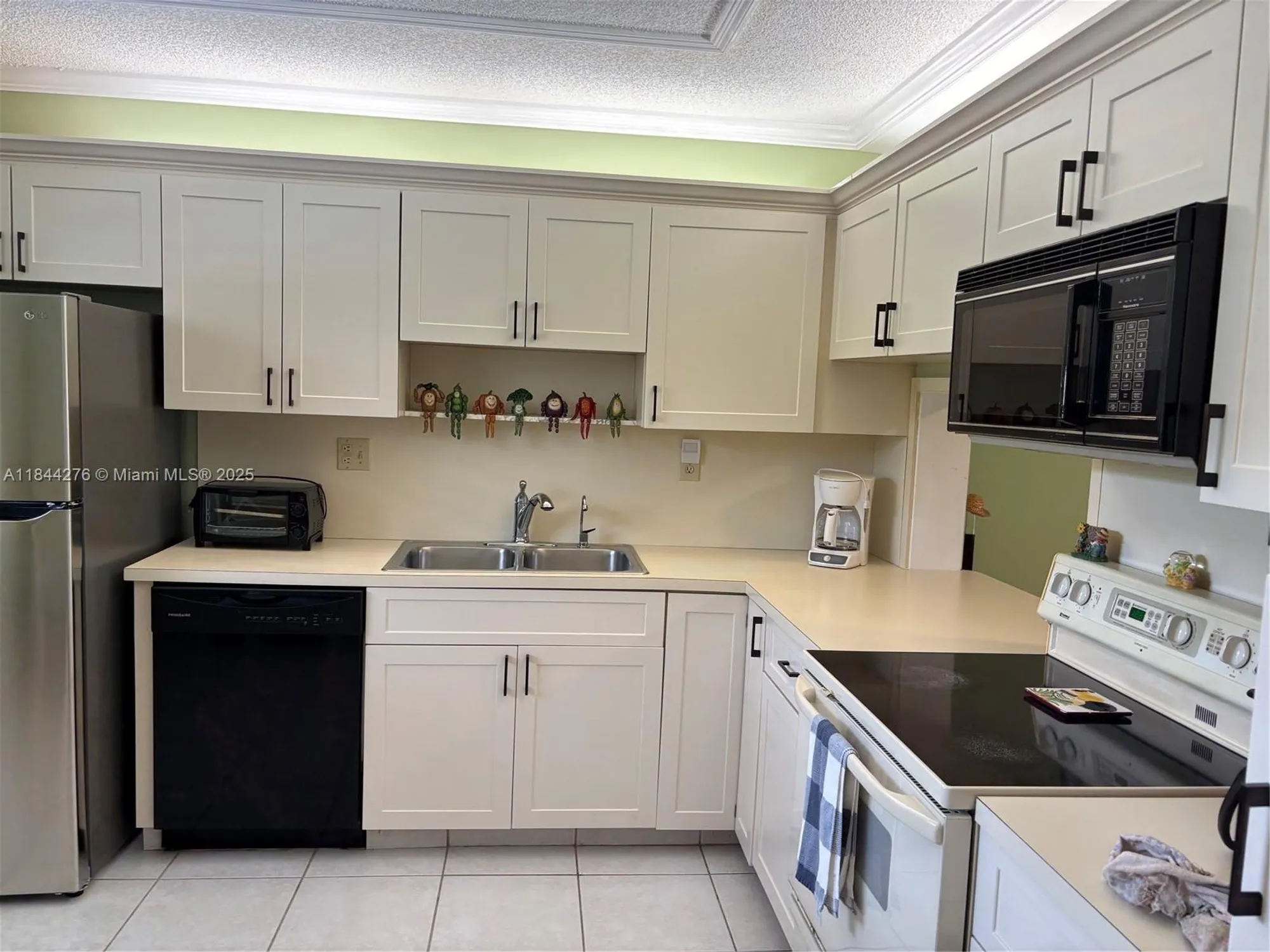 Property Slideshow image 5 of 31 | 4940 e sabal palm blvd 205, Tamarac, FL, 33319