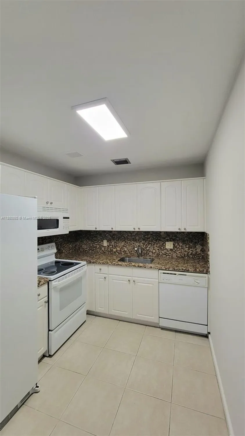 Property Slideshow image 8 of 36 | 251 sw 132nd way h417, Pembroke Pines, FL, 33027