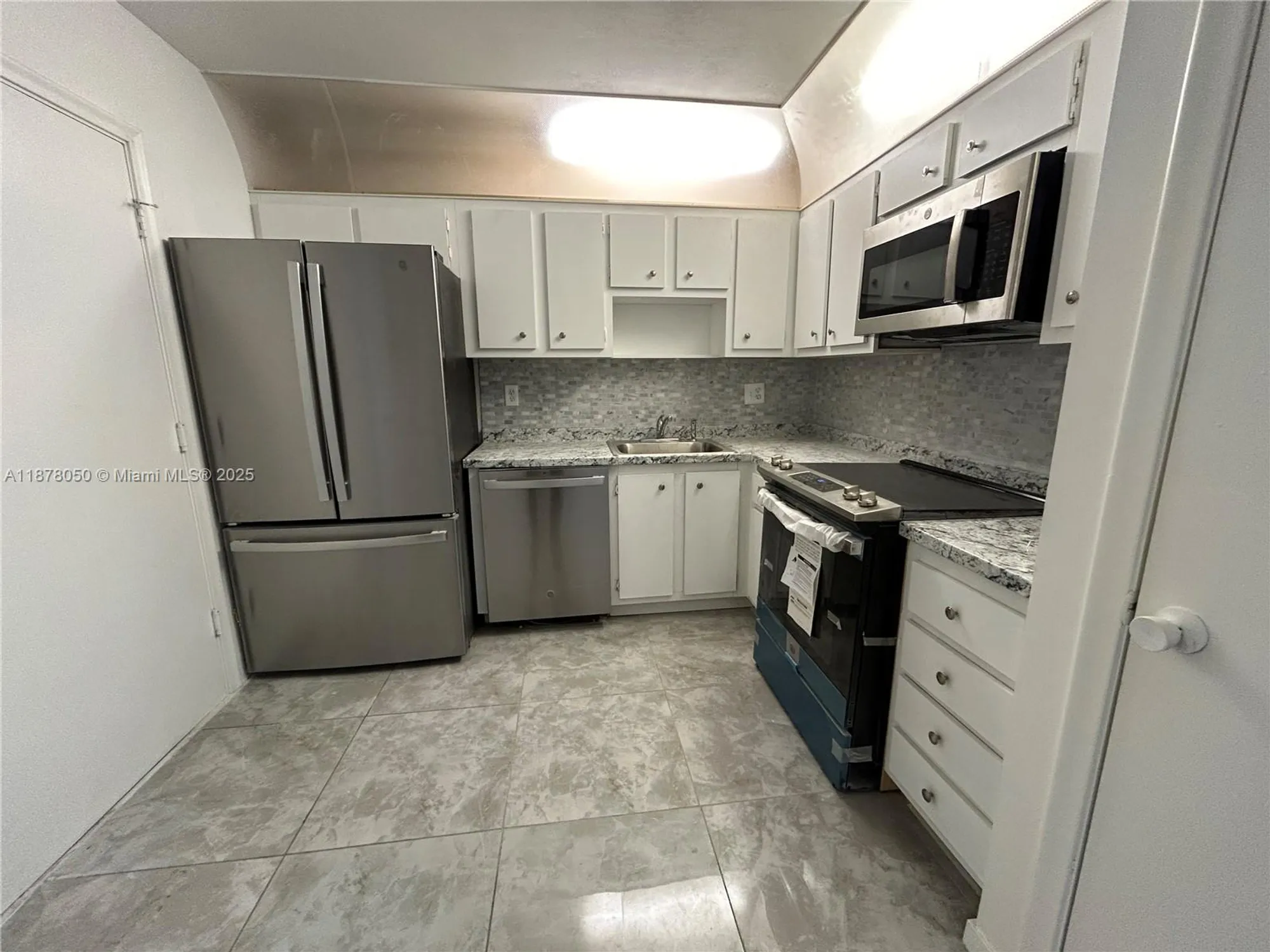 Property Slideshow image 4 of 17 | 2061 nw 47th ter 212, Lauderhill, FL, 33313