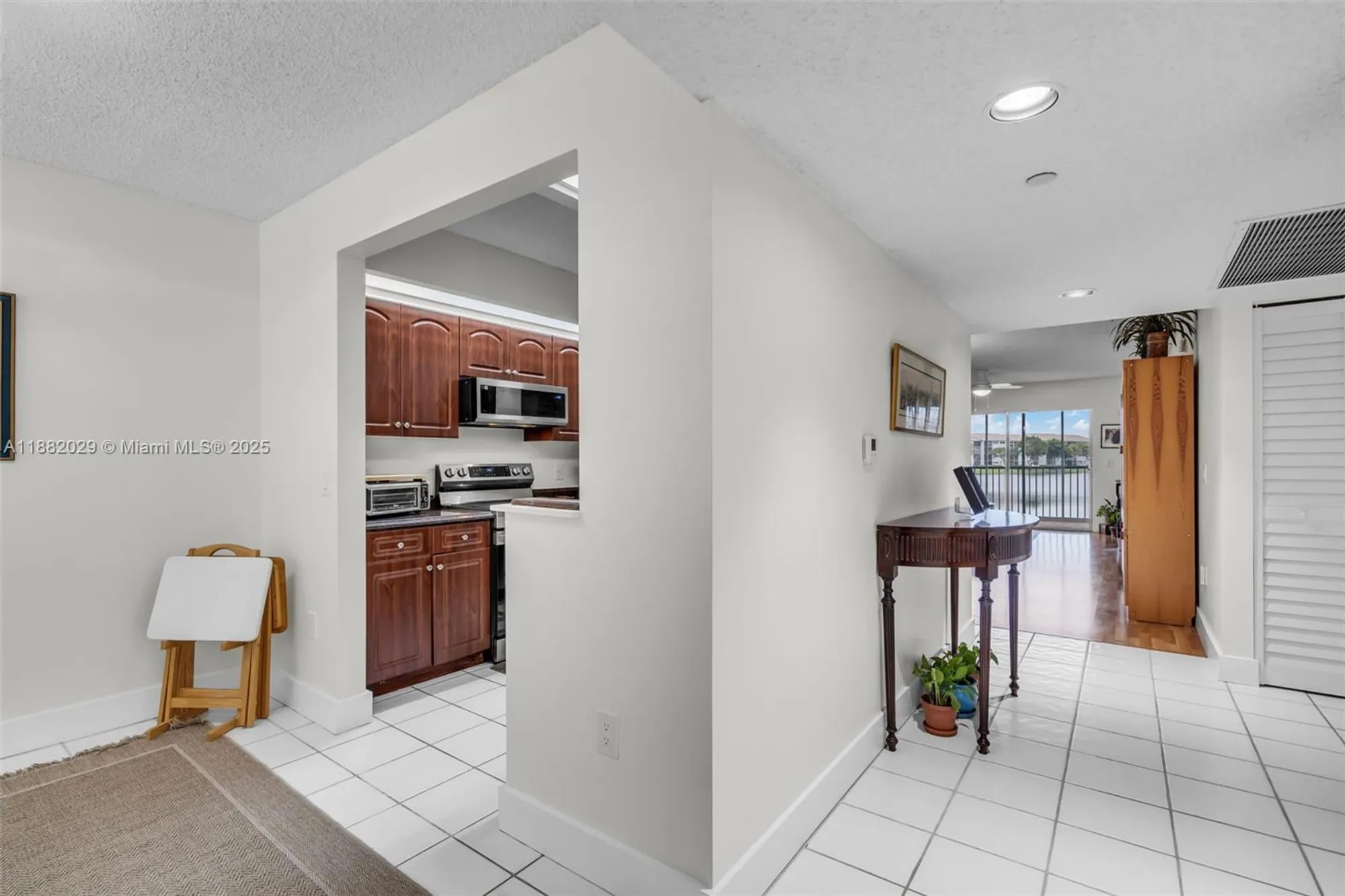 Property Slideshow image 4 of 50 | 13800 sw 5th ct 203m, Pembroke Pines, FL, 33027