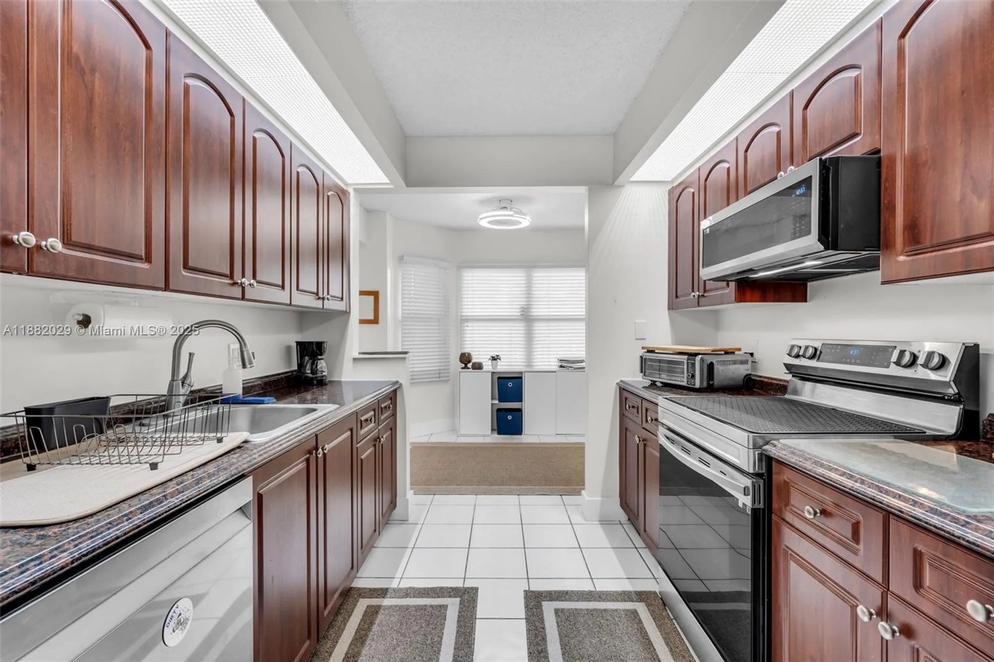 Property Slideshow image 7 of 50 | 13800 sw 5th ct 203m, Pembroke Pines, FL, 33027