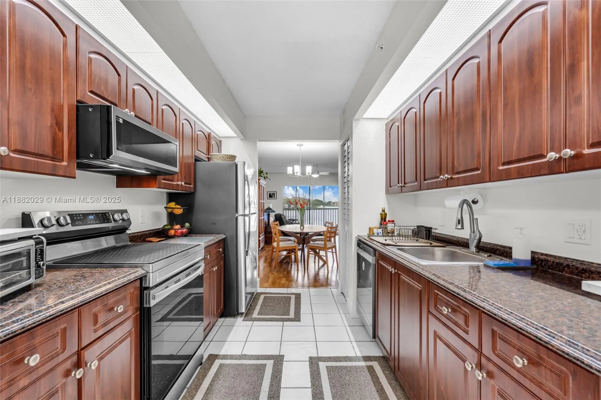 Property Slideshow image 8 of 50 | 13800 sw 5th ct 203m, Pembroke Pines, FL, 33027