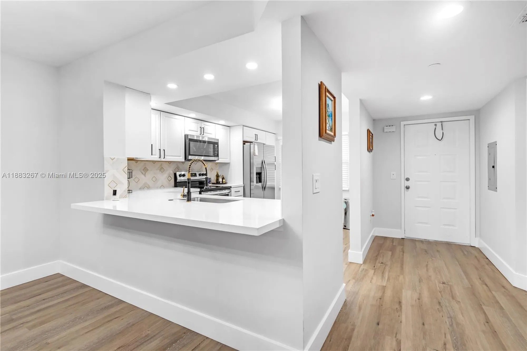 Property Slideshow image 4 of 25 | 701 sw 142nd ave 108s, Pembroke Pines, FL, 33027