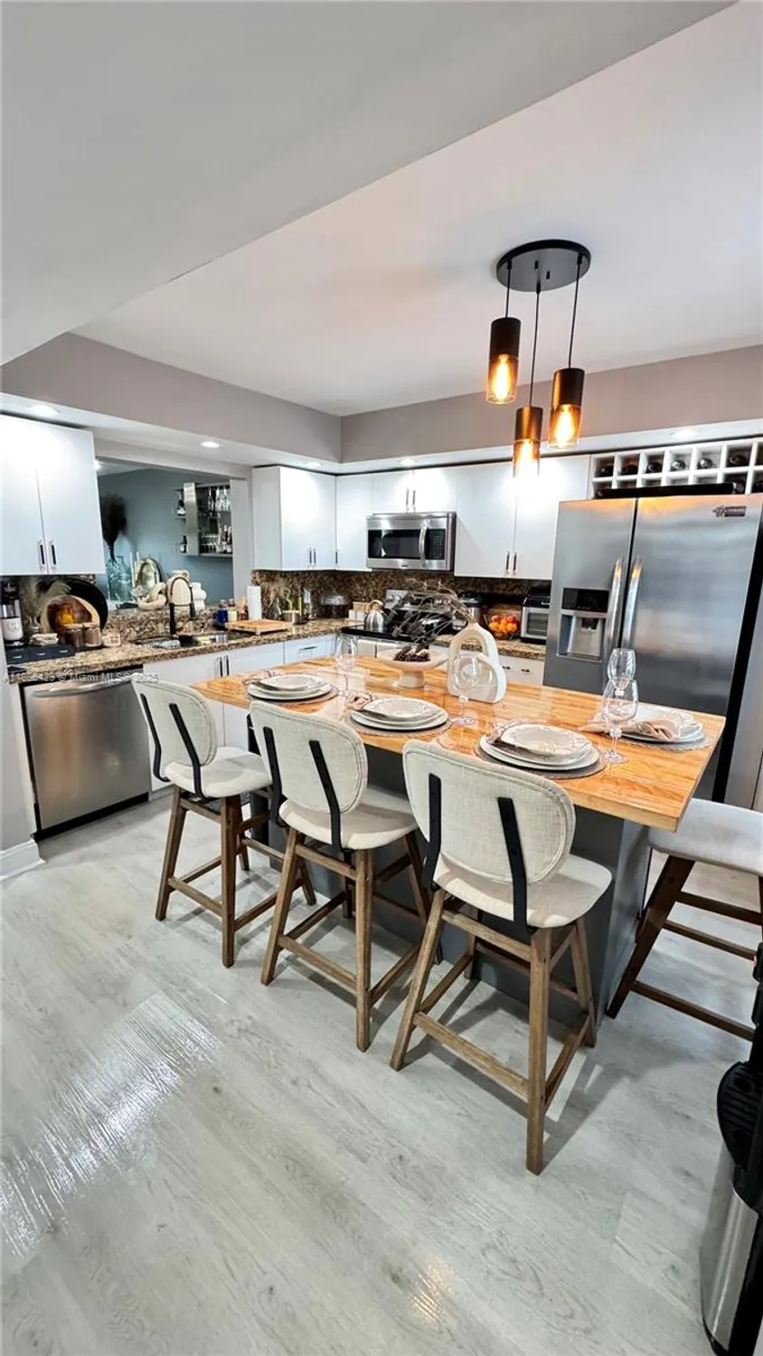 Property Slideshow image 10 of 58 | 300 sw 130th ter 407b, Pembroke Pines, FL, 33027