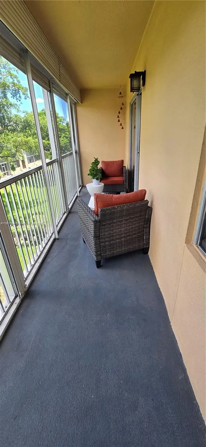 Property Slideshow image 12 of 15 | 13500 sw 1st st 302u, Pembroke Pines, FL, 33027