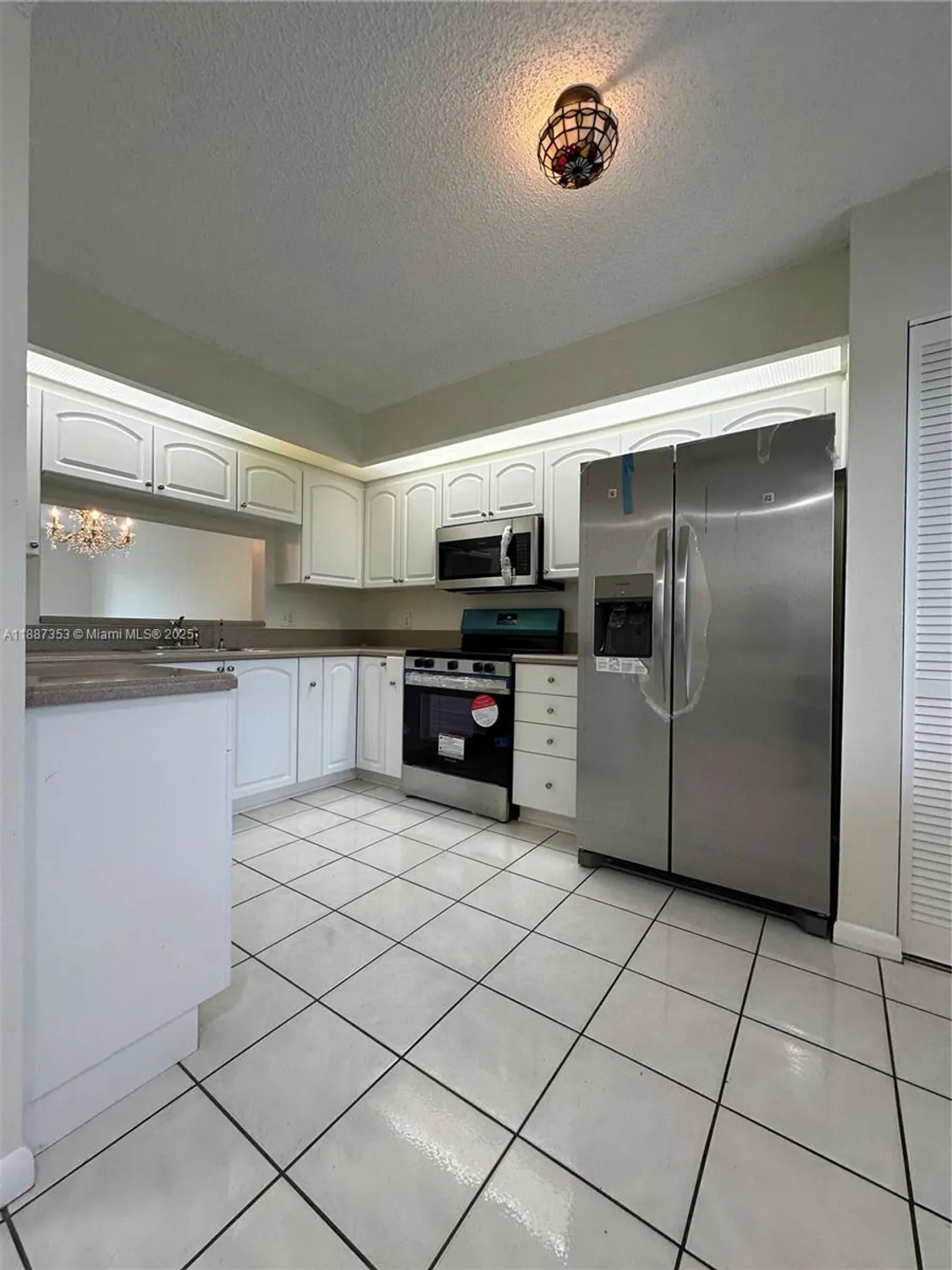 Property Slideshow image 4 of 33 | 12755 sw 16th ct b206, Pembroke Pines, FL, 33027