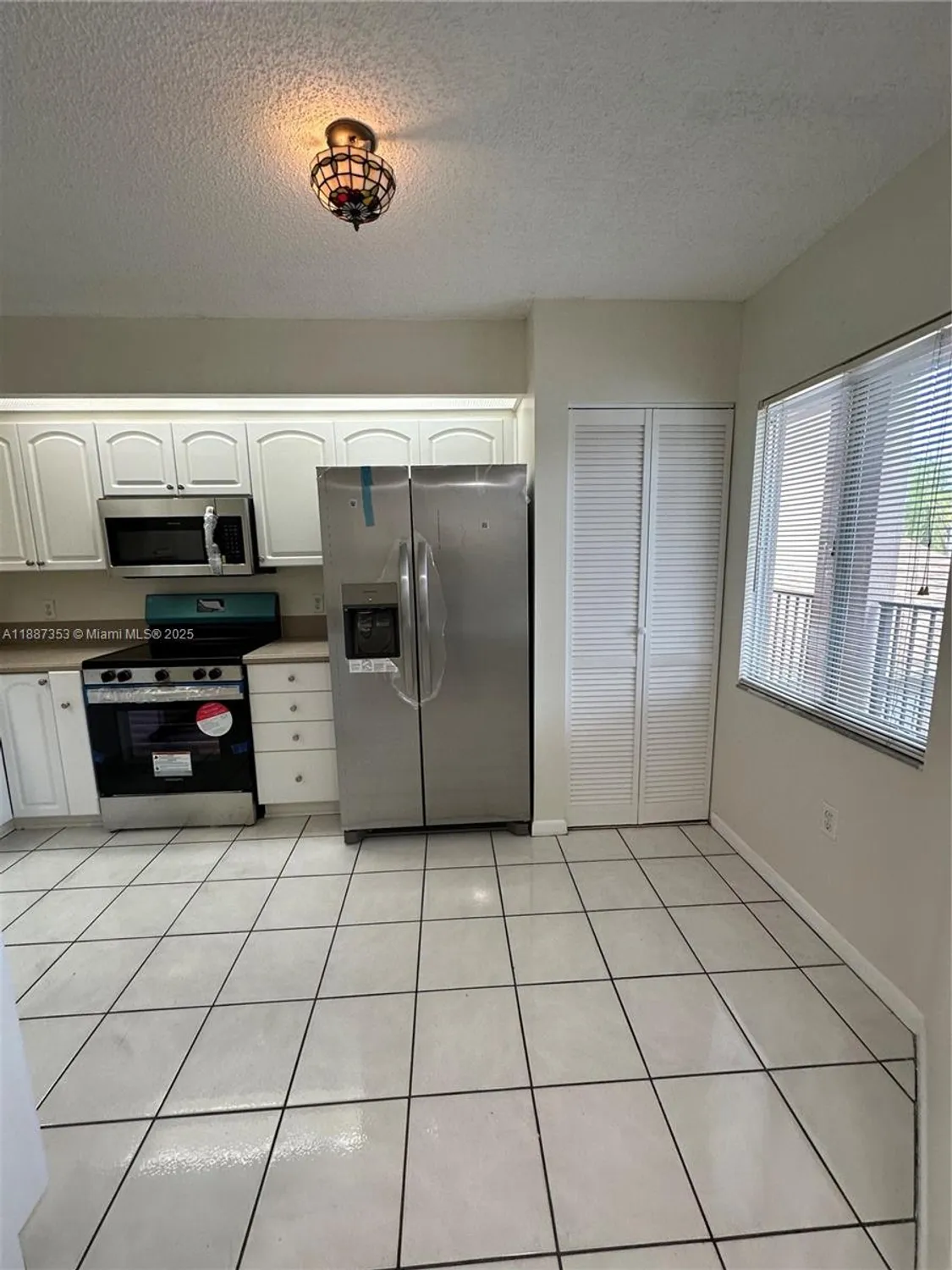 Property Slideshow image 5 of 33 | 12755 sw 16th ct b206, Pembroke Pines, FL, 33027