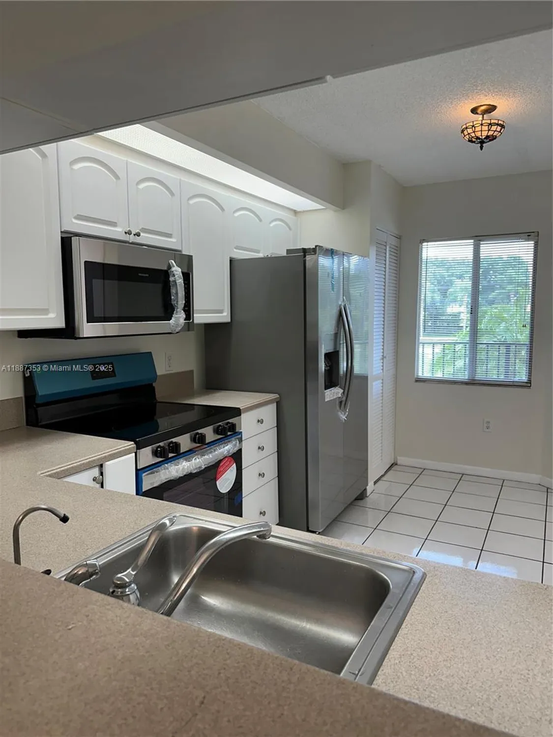 Property Slideshow image 6 of 33 | 12755 sw 16th ct b206, Pembroke Pines, FL, 33027