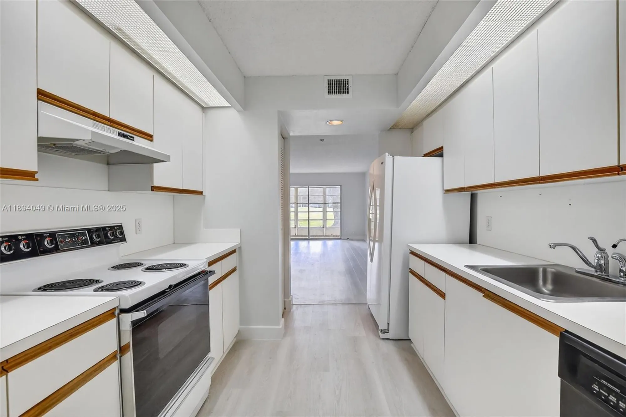 Property Slideshow image 10 of 44 | 701 sw 128th ave 111f, Pembroke Pines, FL, 33027