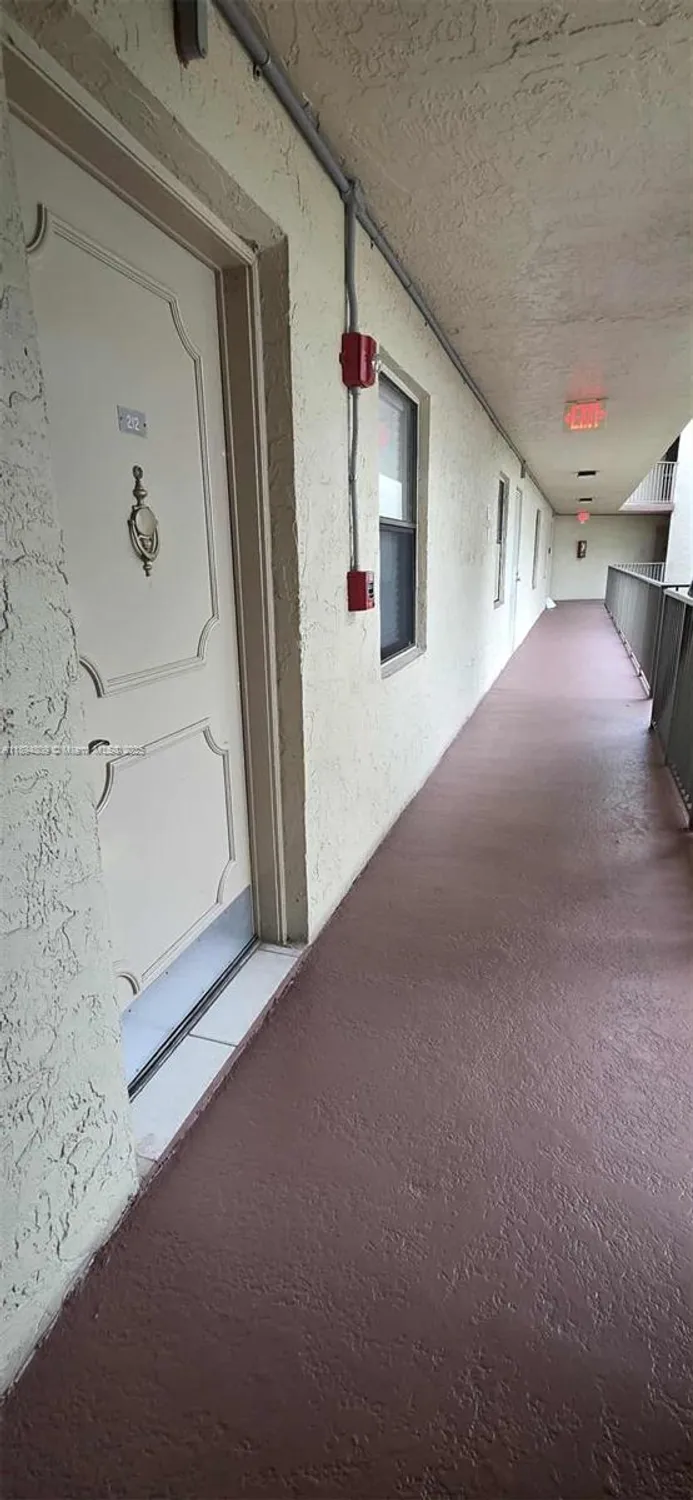 Property Slideshow image 2 of 36 | 8050 w mcnab rd 212, Tamarac, FL, 33321