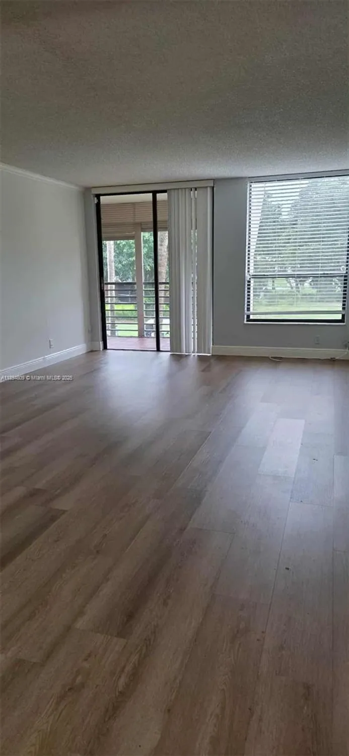 Property Slideshow image 5 of 36 | 8050 w mcnab rd 212, Tamarac, FL, 33321